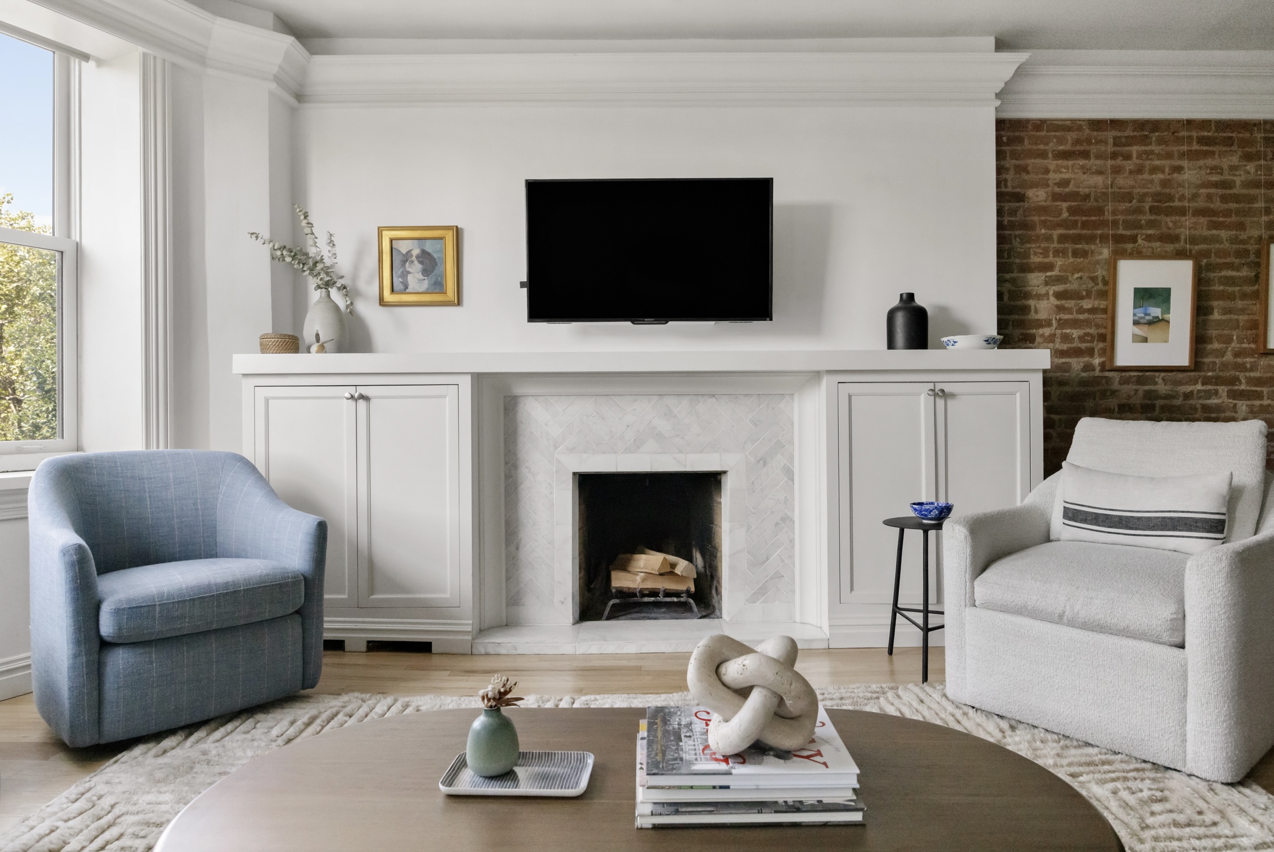 209 Clinton Street, Unit 4L Brooklyn, NY 11201 - Photo 2 of 17 a living room with furniture and a fireplace