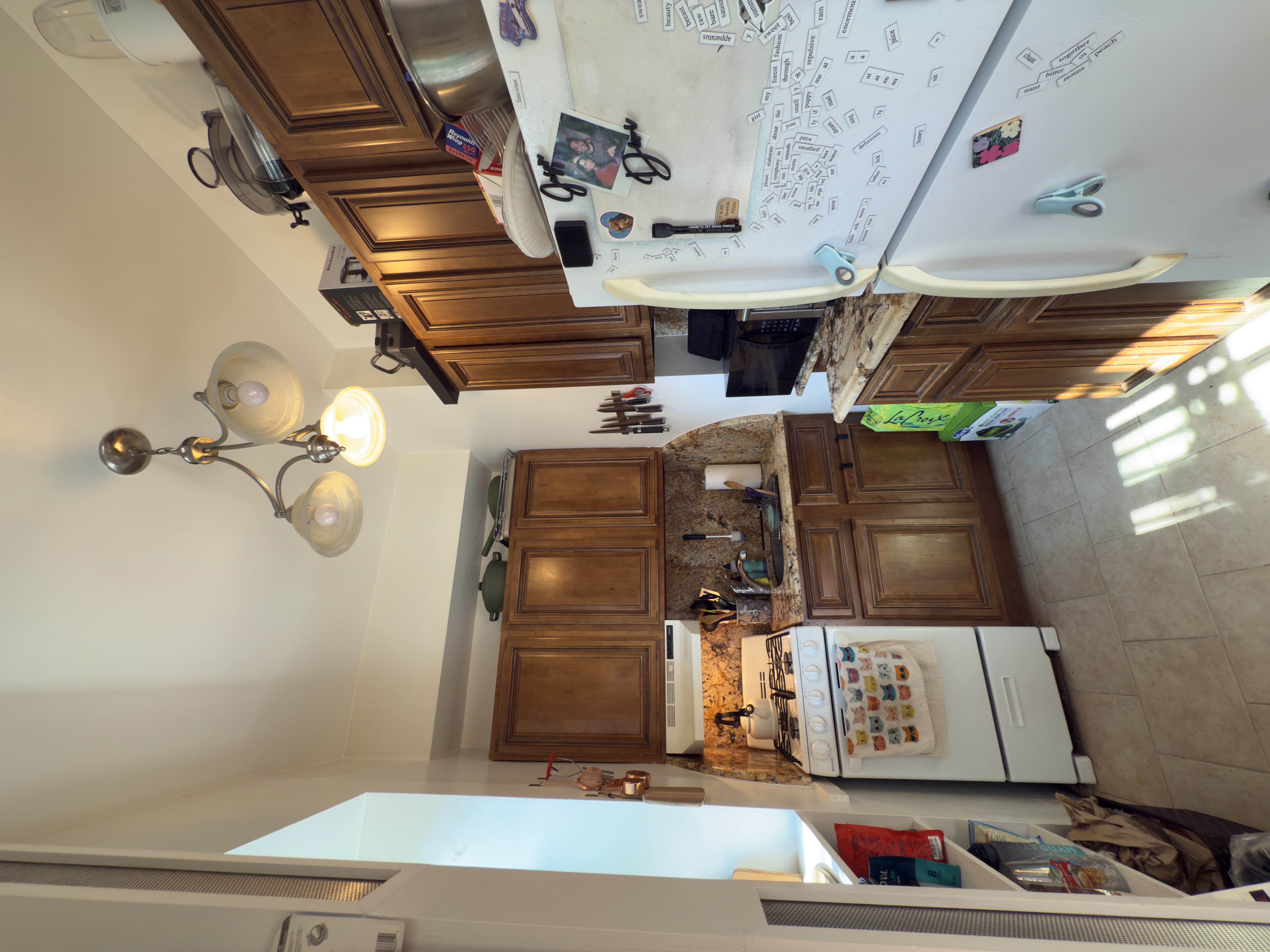 141 7th Avenue, Unit 1 Brooklyn, NY 11215 - Photo 5 of 16 a kitchen with stainless steel appliances granite countertop a stove and a sink