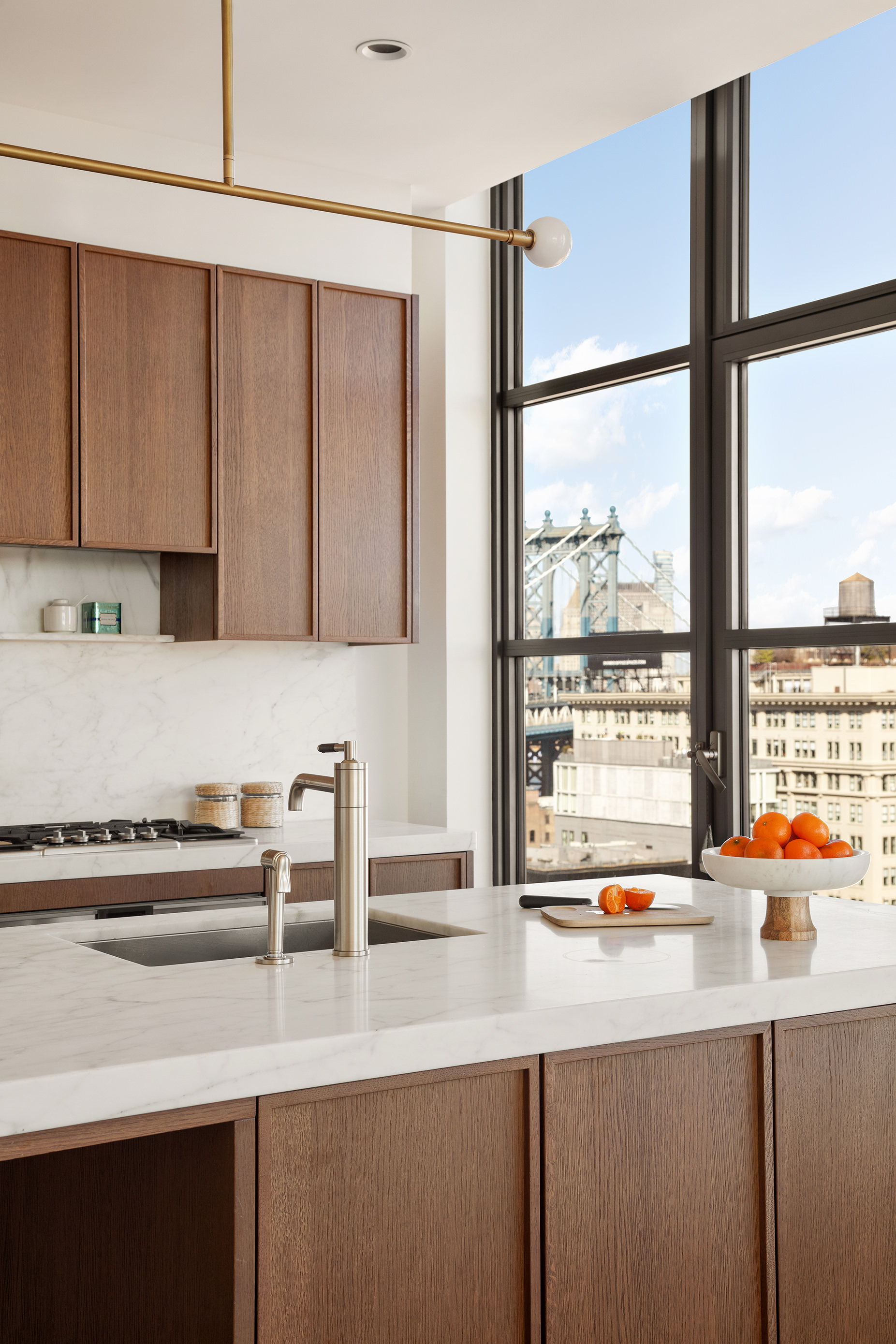 180 Front Street, Unit 11E Brooklyn, NY 11201 - Photo 3 of 27 a kitchen with a sink and a counter top space