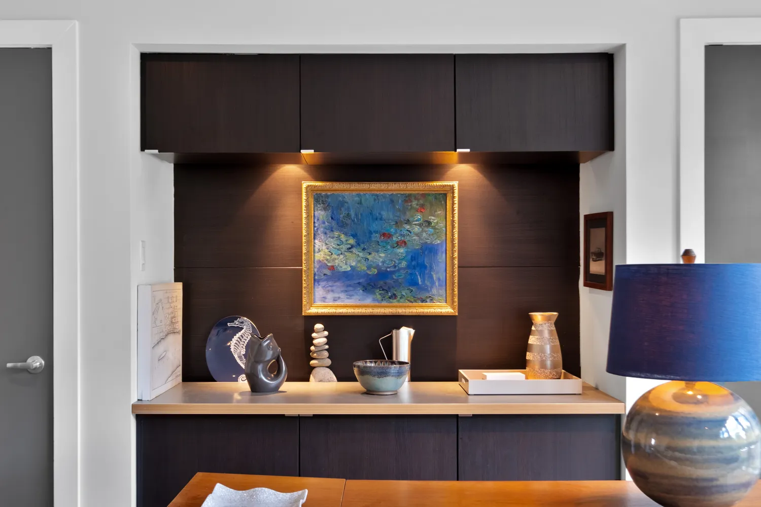 a bedroom with furniture and a rug