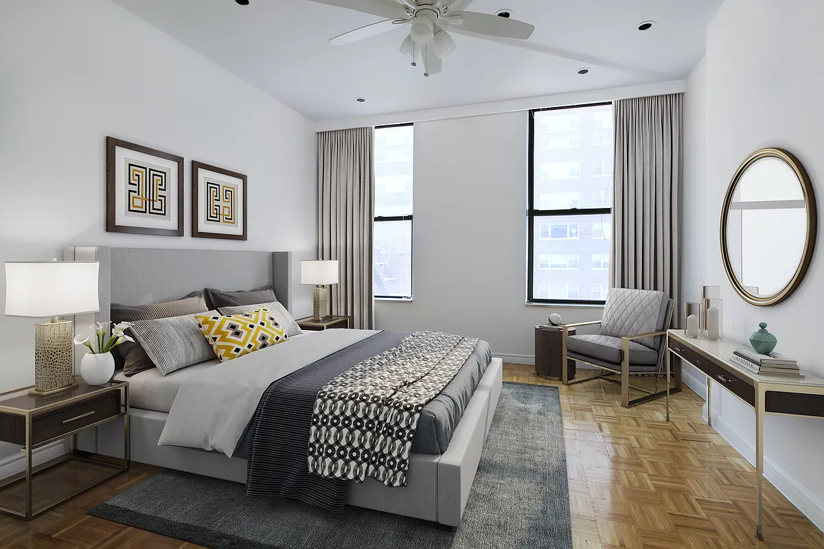 1313 3rd Avenue, Unit 4FN Manhattan, NY 10021 - Photo 2 of 4 a bedroom with a bed a mirror and a window