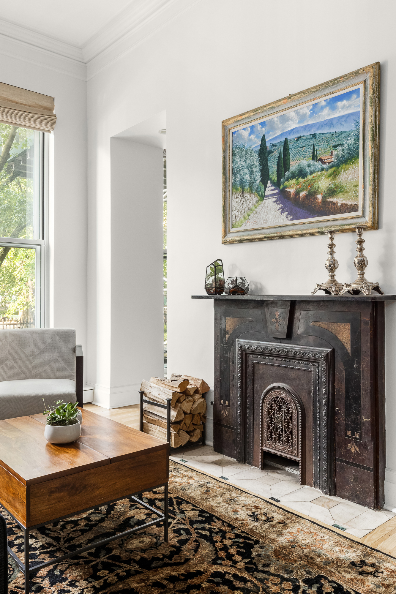 308 East 15th Street, Unit PARLOR Manhattan, NY 10003 - Photo 3 of 16 a living room with furniture and a fireplace