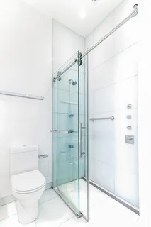 a view of a backyard with sitting area