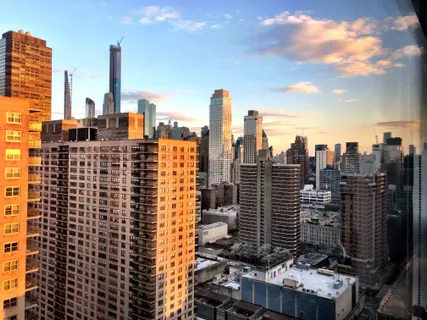 a view of a city with tall buildings