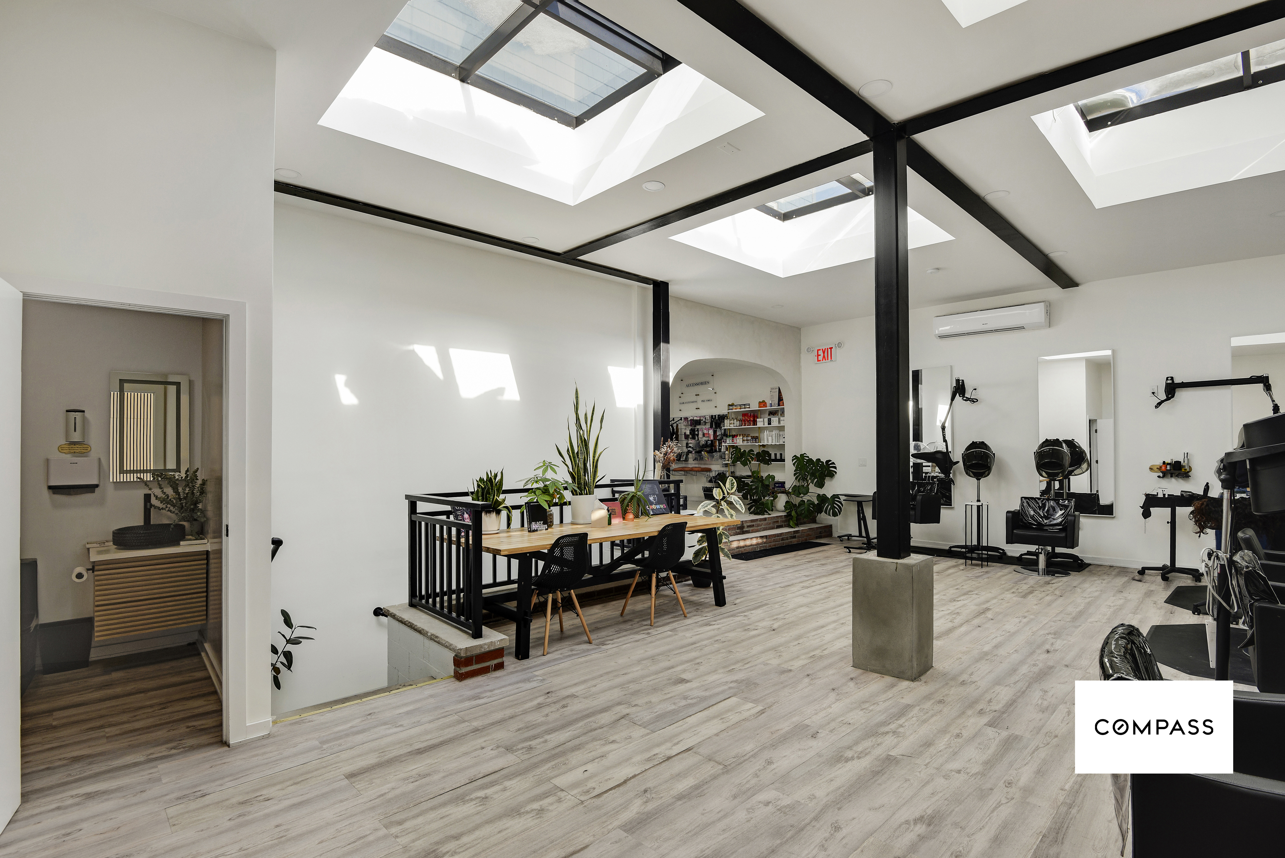 42 Jackson Street Brooklyn, NY 11211 - Photo 5 of 12 a living room with furniture and wooden floor