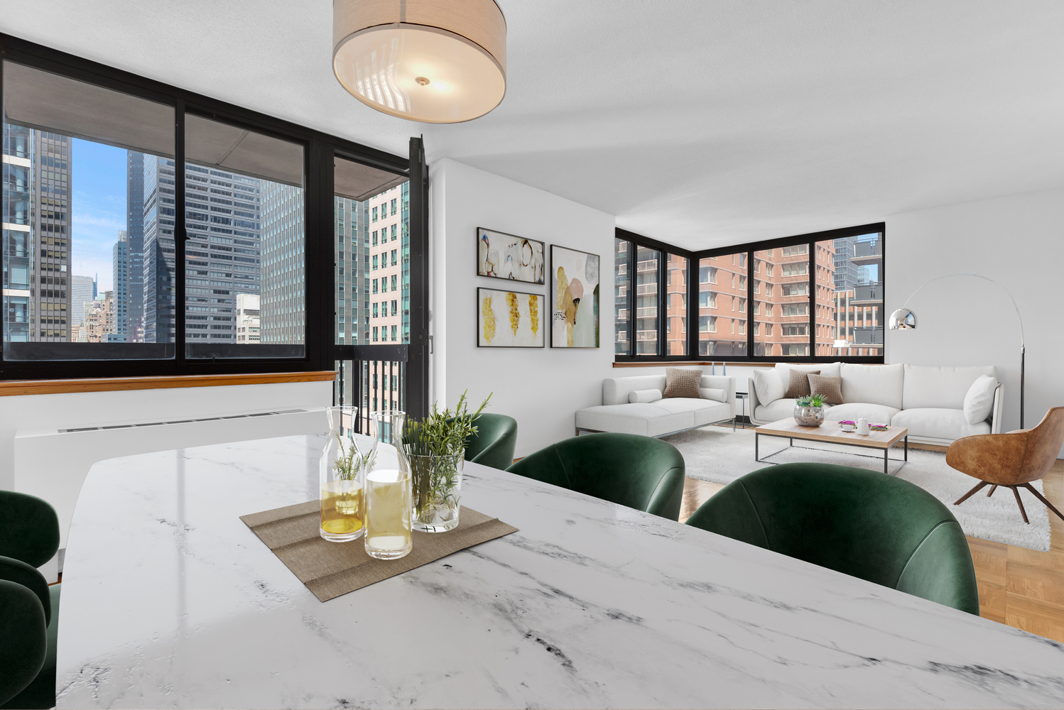 250 East 40th Street, Unit 22B Manhattan, NY 10016 - Photo 3 of 13 a living room with furniture and a large window