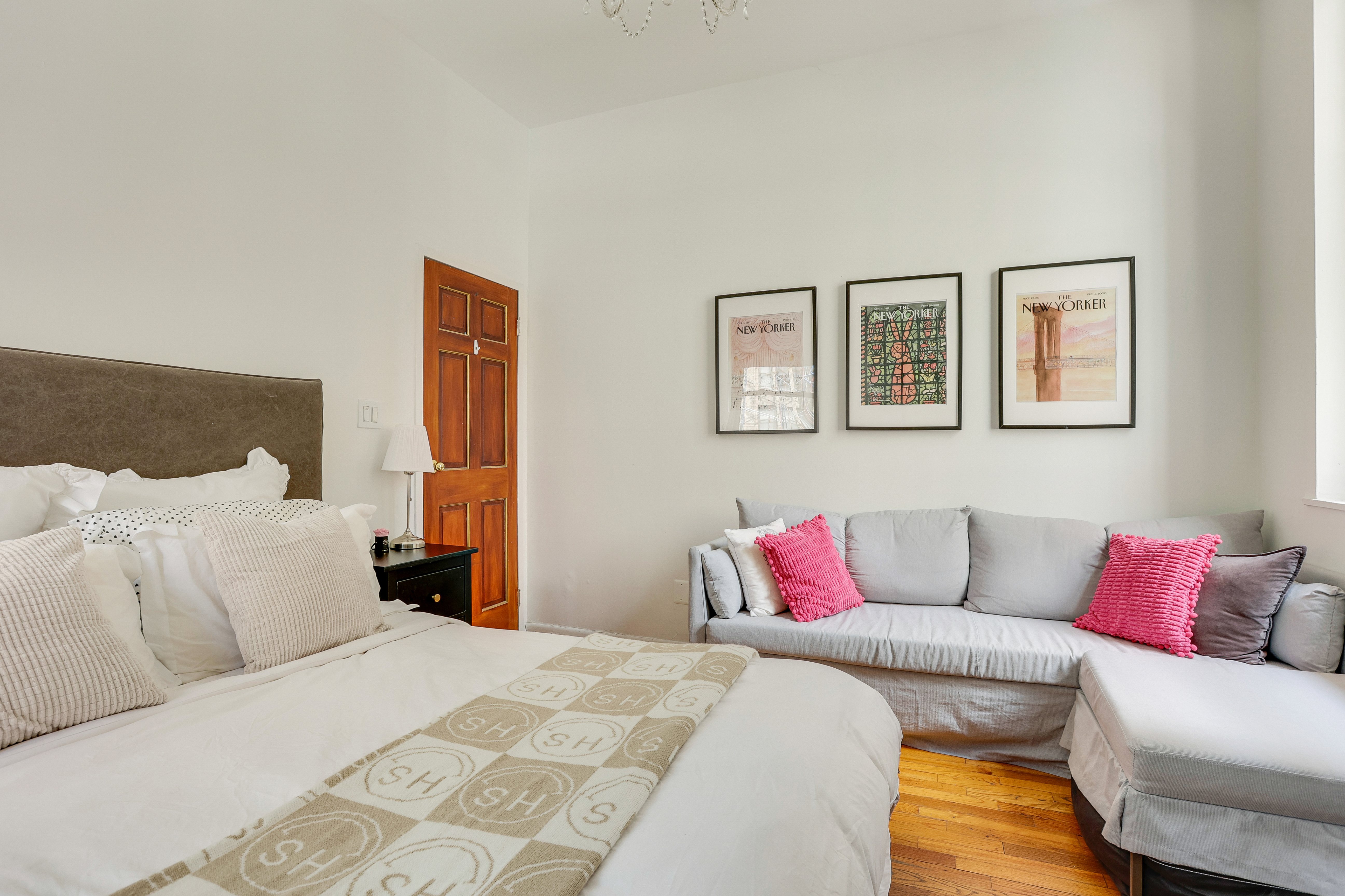 159 Madison Avenue, Unit 4G Manhattan, NY 10016 - Photo 5 of 14 a bed room with a bed and a couch