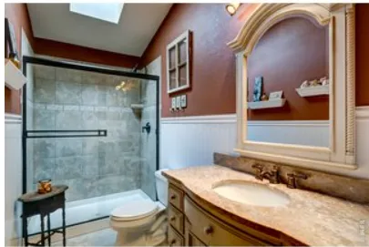 a living room with furniture window and a fireplace