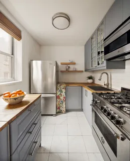 a kitchen with a stove and a sink