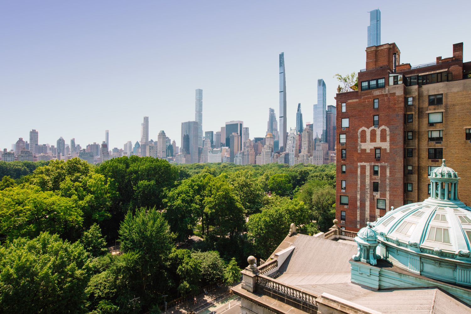 a view of a city with tall buildings