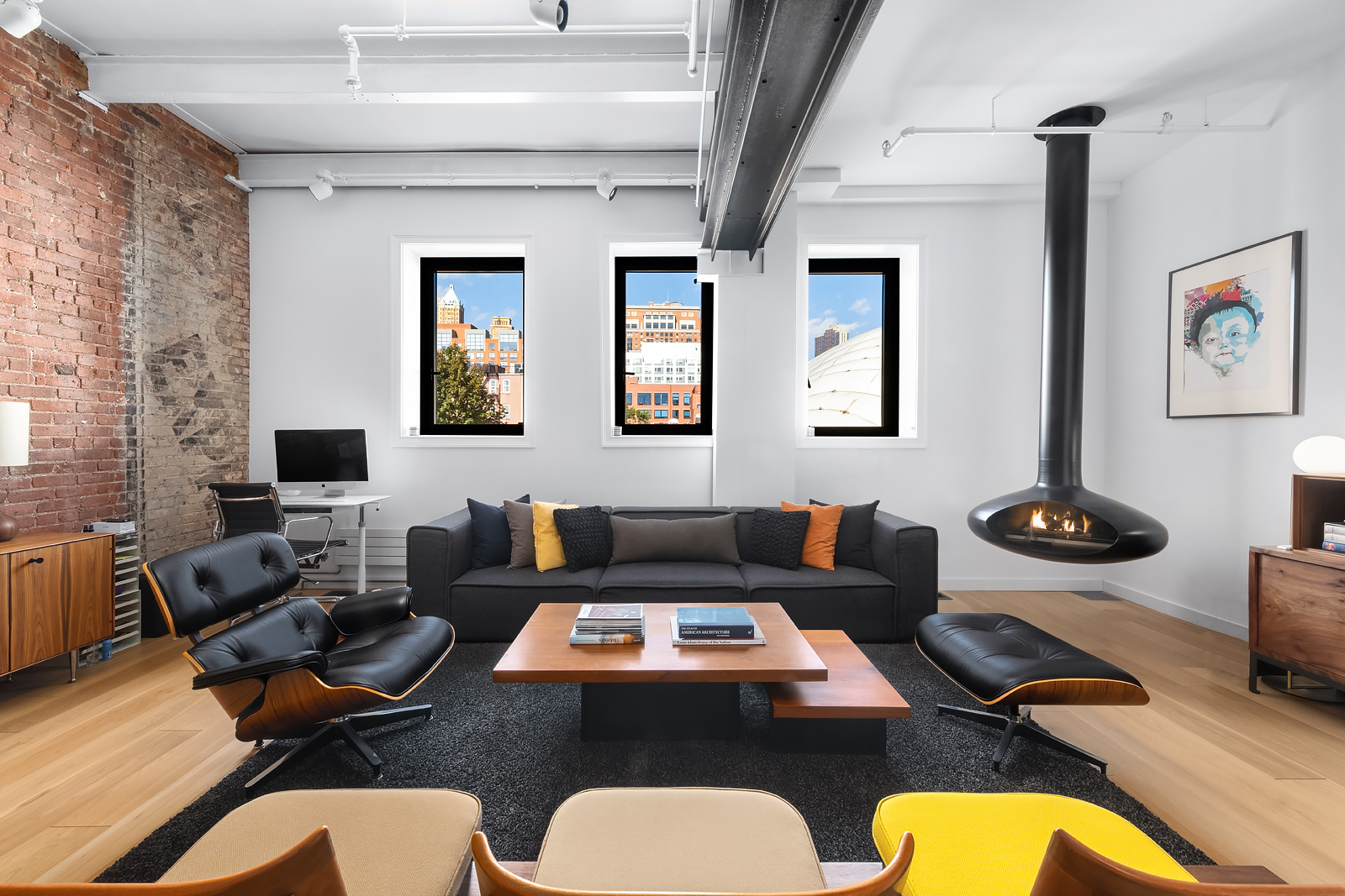 a living room with furniture rug and a window