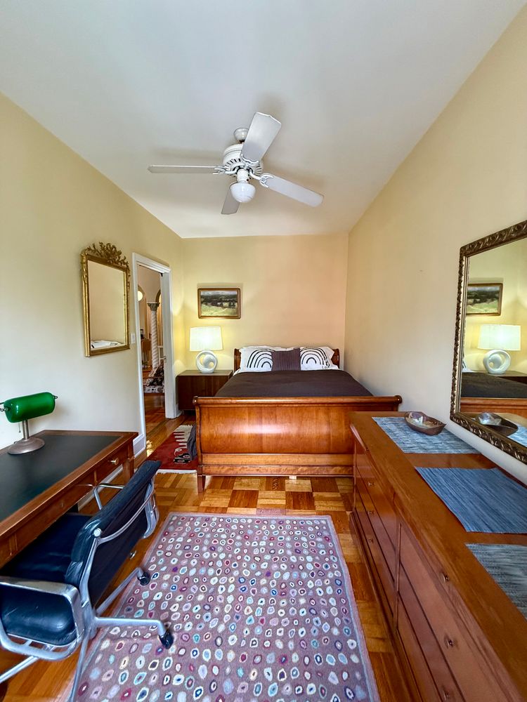 46 St Marks Place, Unit 7 Manhattan, NY 10003 - Photo 5 of 7 a bedroom with a bed and wooden floor