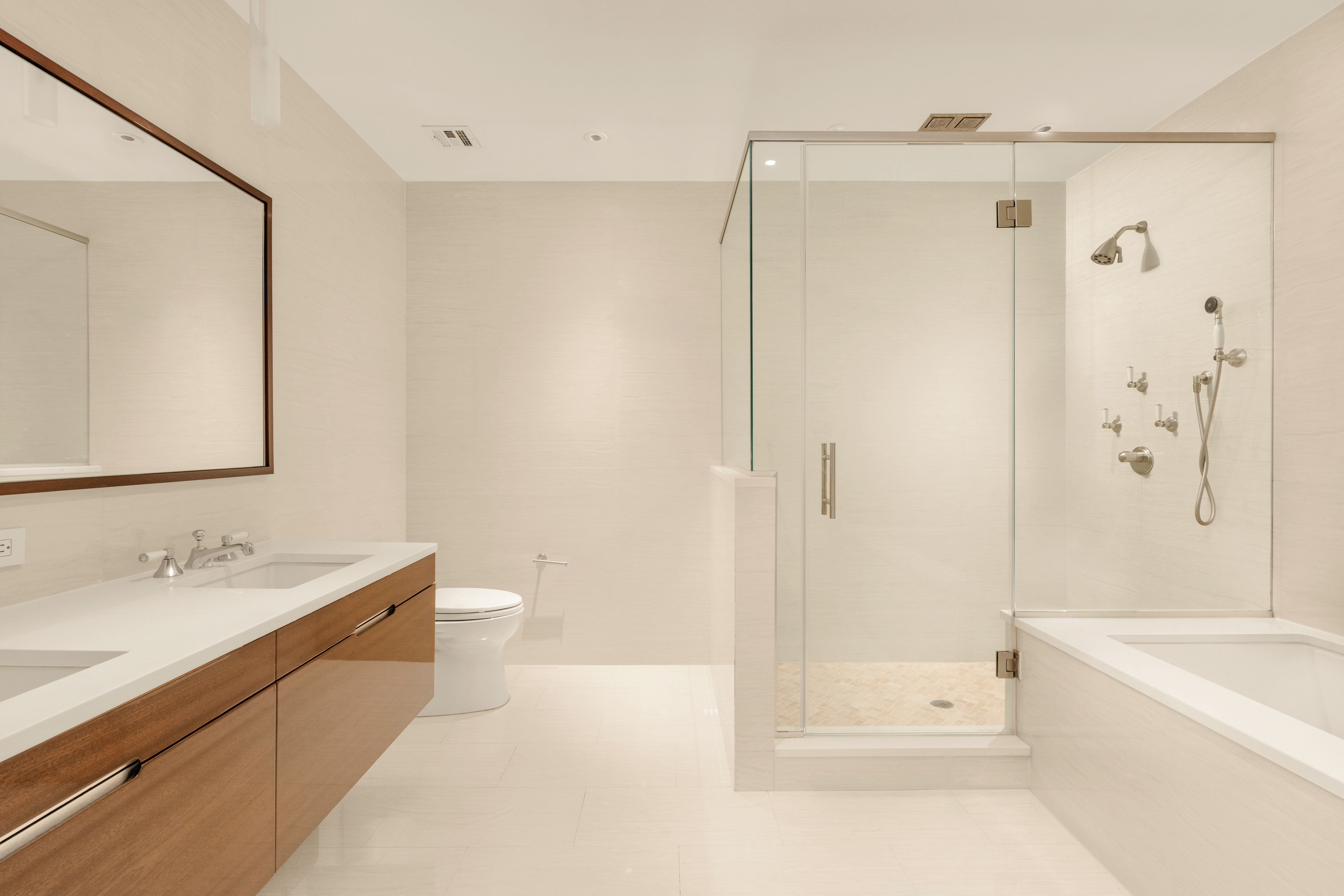 60 Beach Street, Unit 3C Manhattan, NY 10013 - Photo 6 of 9 a bathroom with a tub shower sink and mirror