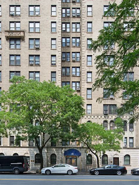 41 West 72nd Street, Unit 15E Manhattan, NY 10023 - Photo 11 of 12 a car parked in front of a building