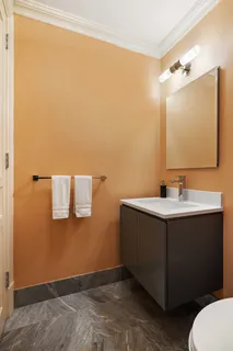 a bathroom with a sink and mirror