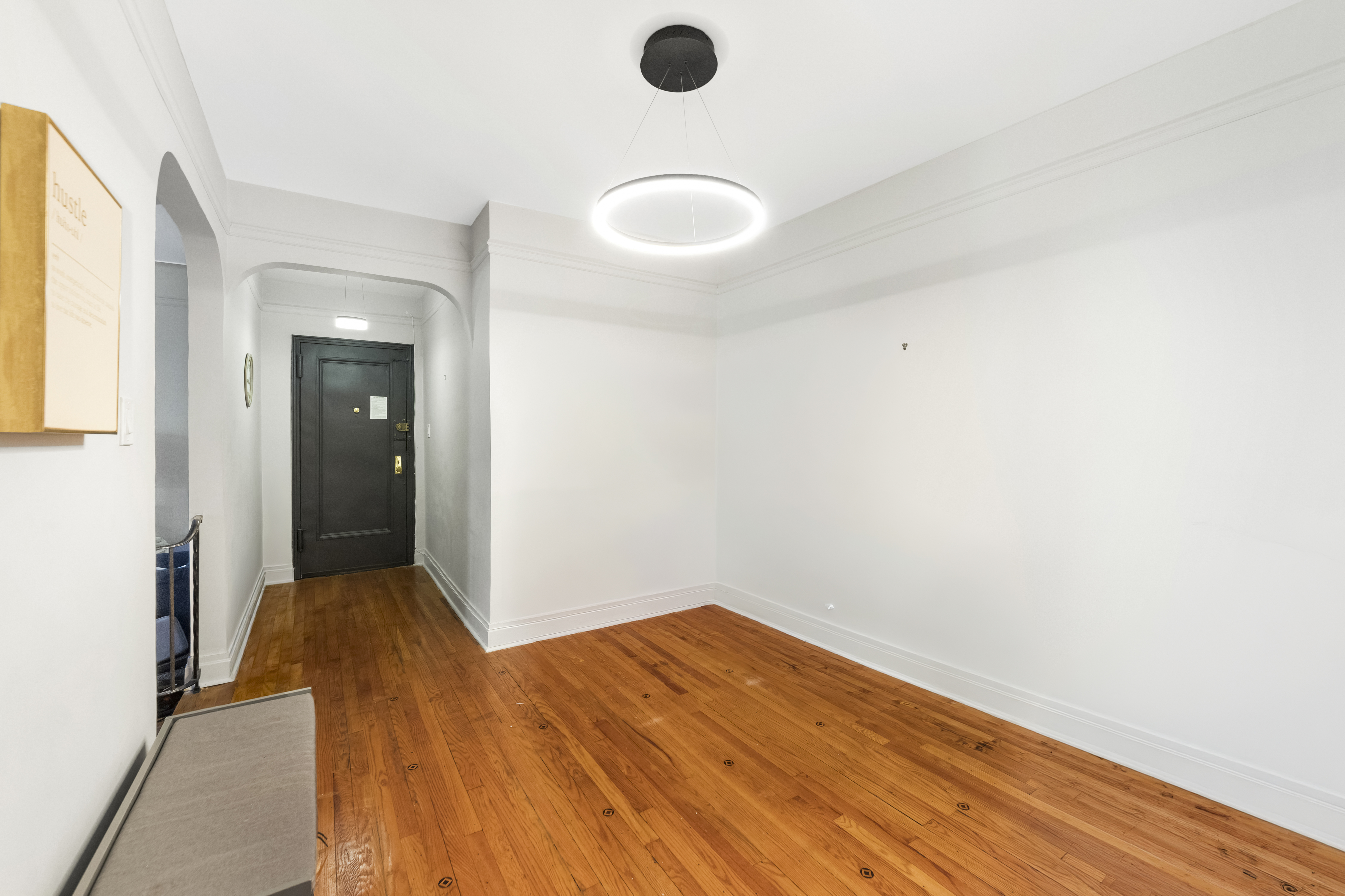 3220 Avenue H, Unit 6N Brooklyn, NY 11210 - Photo 2 of 9 a view of a livingroom with wooden floor