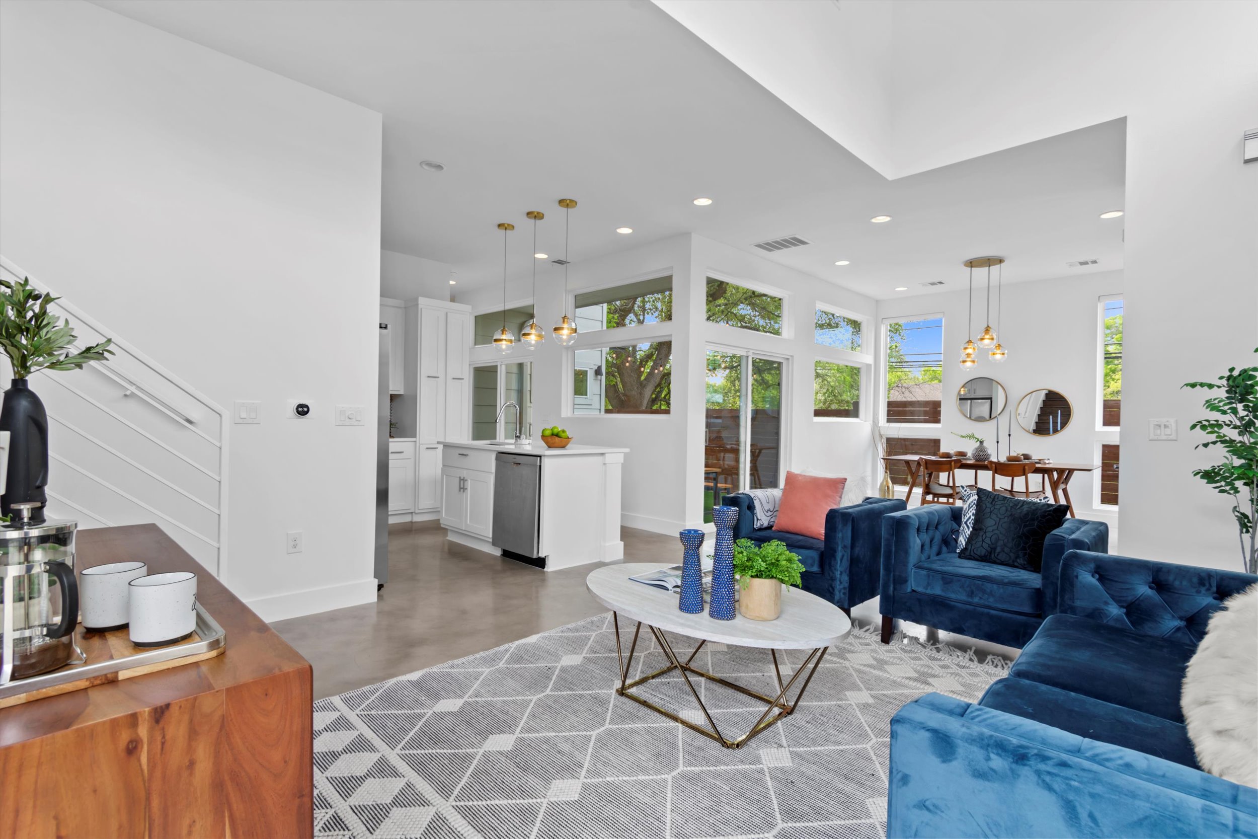 513 West Croslin Street, Unit A Austin, TX 78752 - Photo 9 of 39 a living room with furniture and a view of kitchen