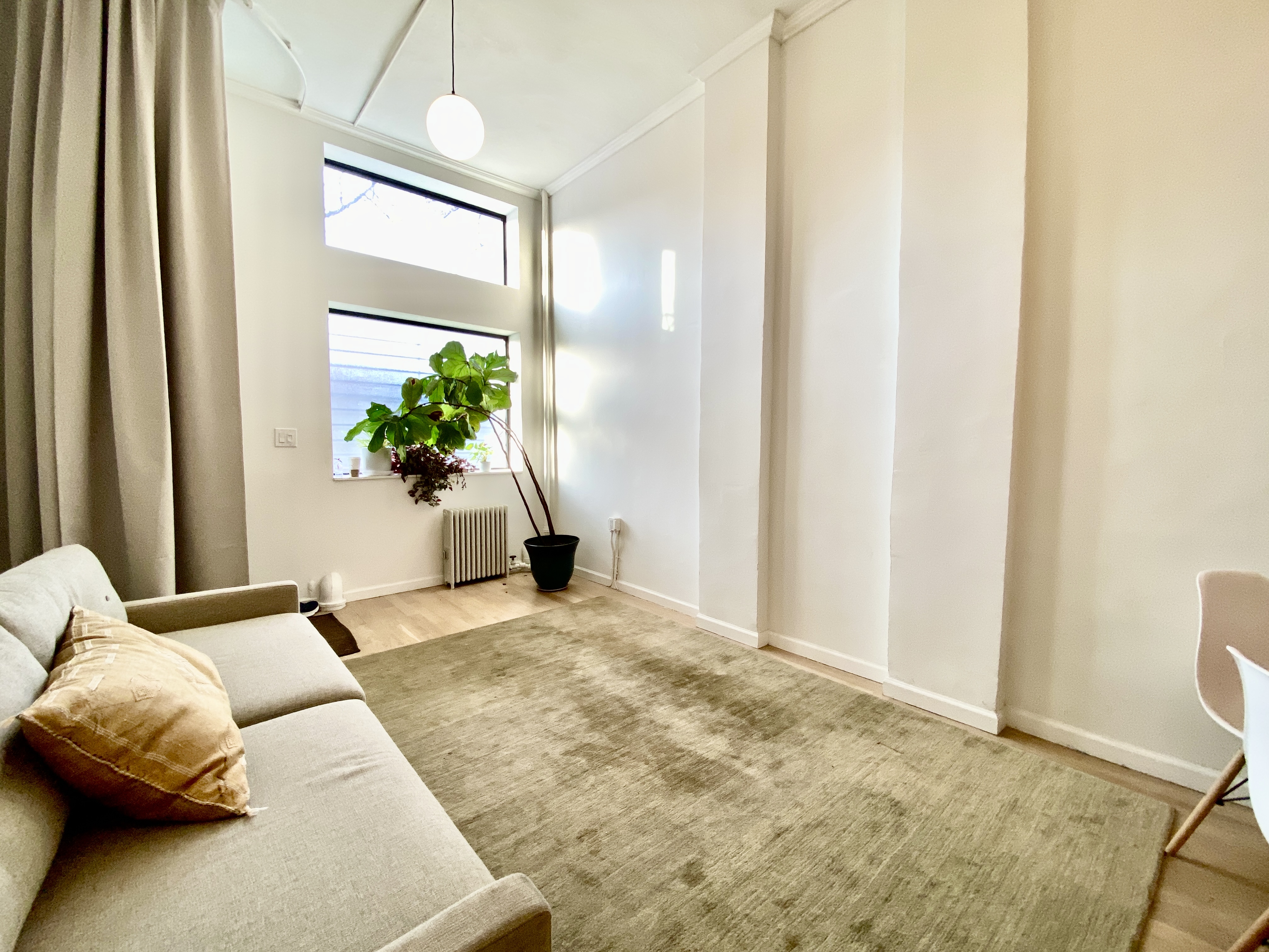 409 Smith Street, Unit 1 Brooklyn, NY 11231 - Photo 7 of 9 a bedroom with a bed and a potted plant