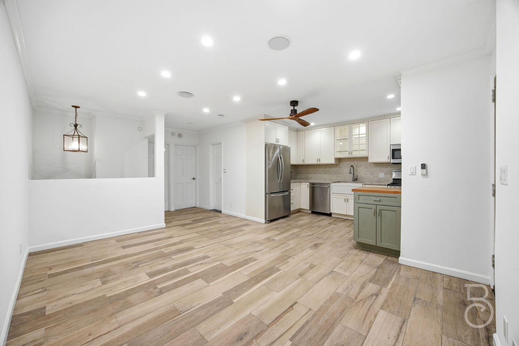 22-61 46th Street Queens, NY 11105 - Photo 18 of 24 a view of kitchen with wooden floor