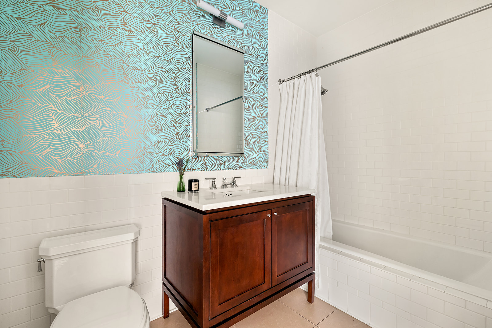 1 Hanson Place, Unit 11J Brooklyn, NY 11243 - Photo 9 of 10 a bathroom with a granite countertop sink toilet and shower