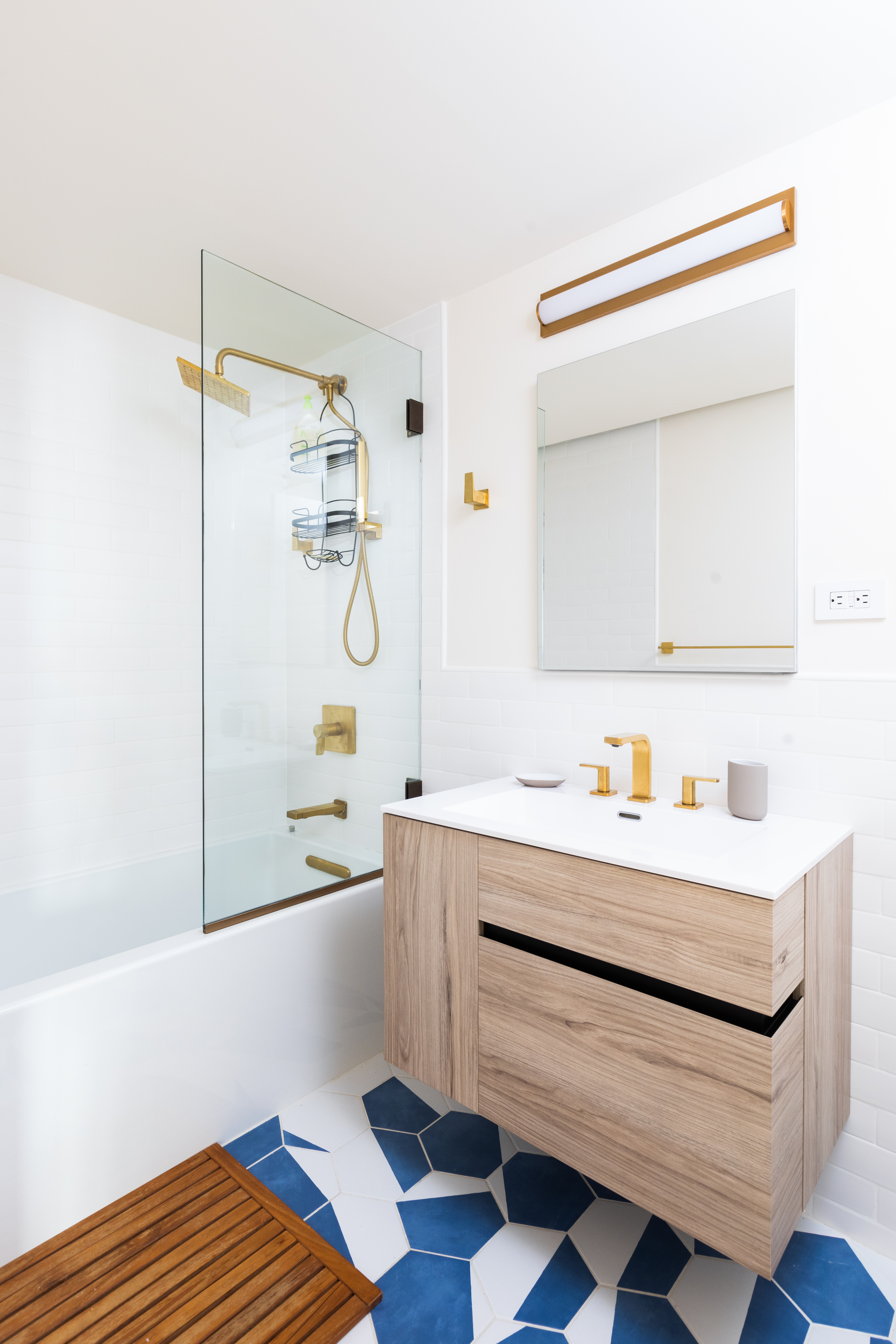 651 Leonard Street, Unit 1A Brooklyn, NY 11222 - Photo 6 of 12 a bedroom with a bed and a mirror