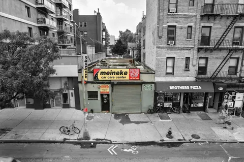 a front view of a building with street