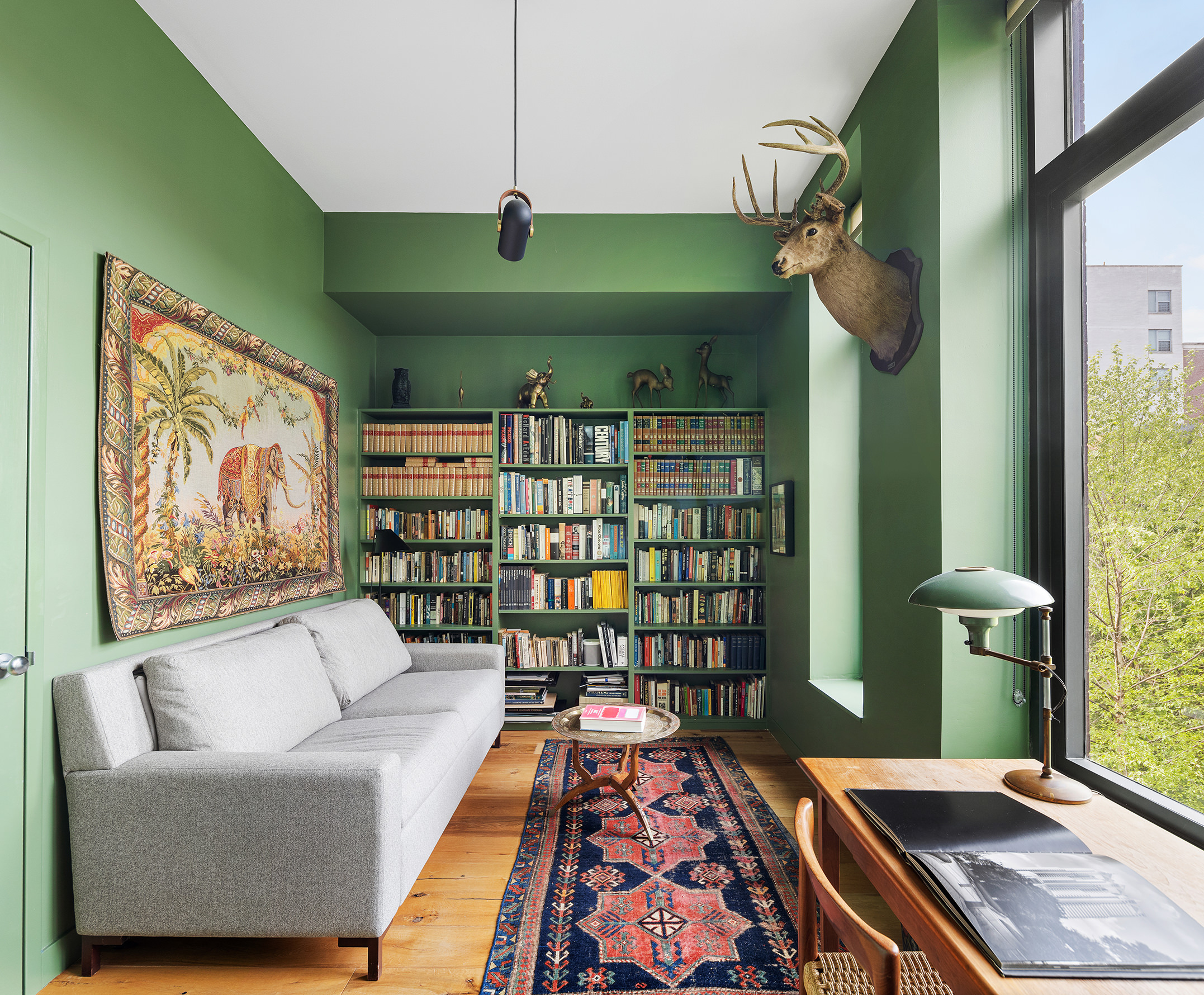 14 Vanderbilt Avenue Brooklyn, NY 11205 - Photo 8 of 17 a living room with furniture and a book shelf