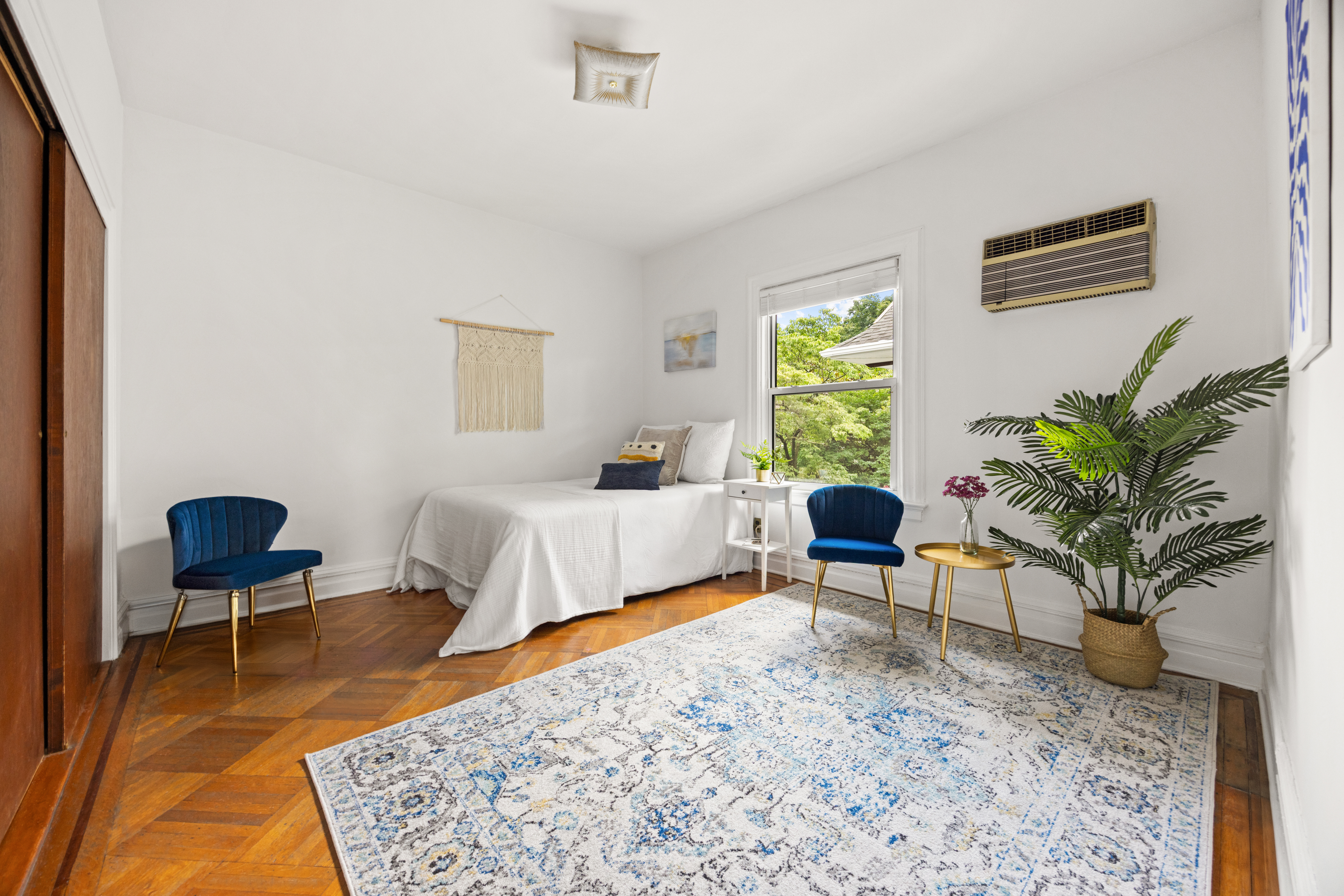 481 Stratford Road Brooklyn, NY 11218 - Photo 14 of 25 a bedroom with a bed and a chair