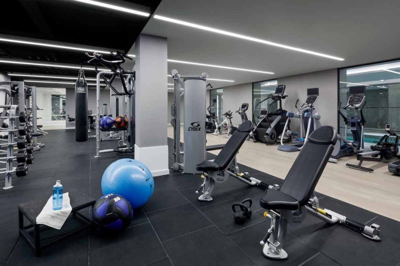 90 Lexington Avenue, Unit MC Manhattan, NY 10016 - Photo 17 of 26 a view of a room with gym equipment