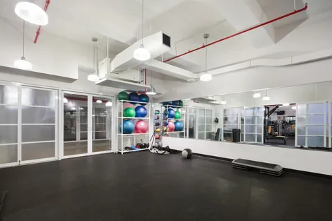 a view of a room with gym equipment