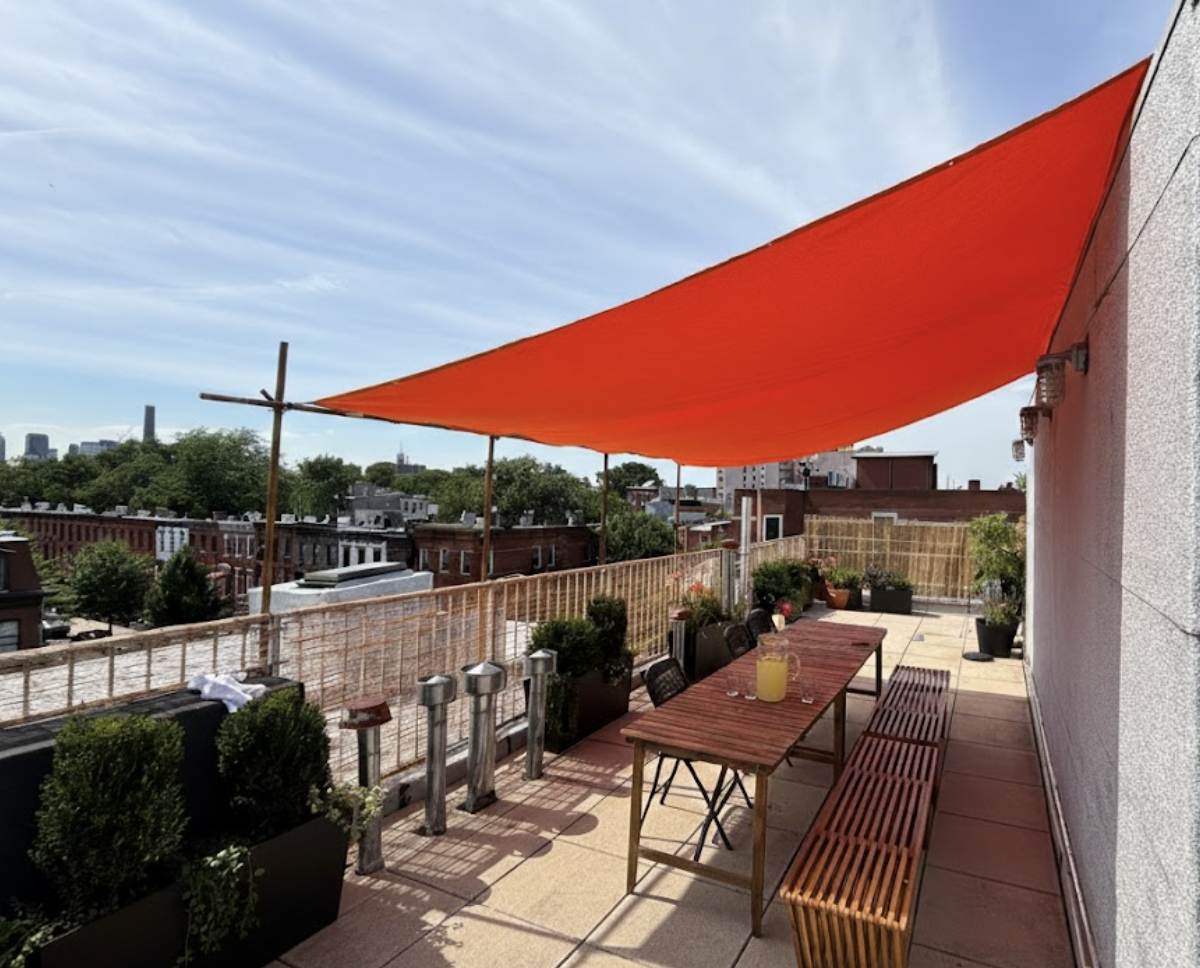 272 Putnam Avenue, Unit B Brooklyn, NY 11216 - Photo 11 of 13 a terrace with outdoor seating and city view