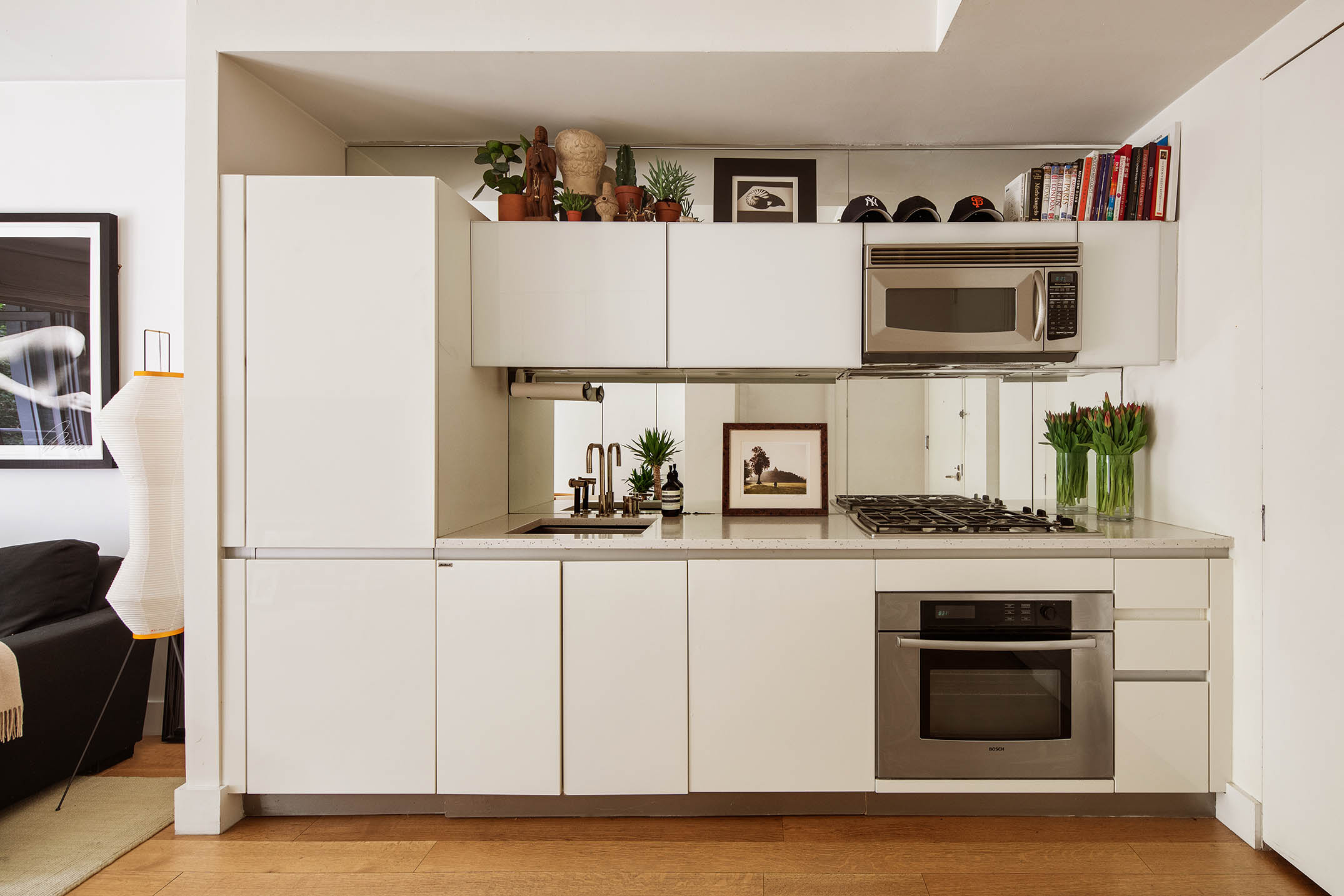 425 East 13th Street, Unit 3F Manhattan, NY 10009 - Photo 9 of 16 a kitchen with stainless steel appliances granite countertop a refrigerator and a stove top oven