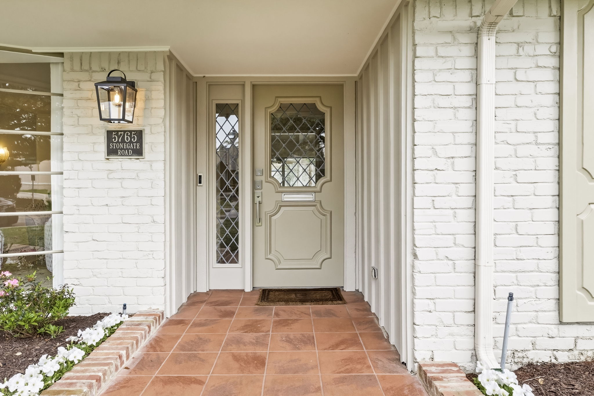 5765 Stonegate Road Dallas, TX 75209 - Photo 2 of 37 a view of a entryway with front door