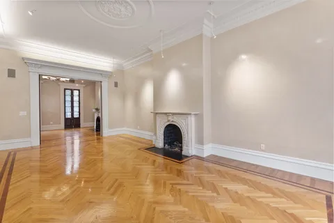 a view of a livingroom and a fireplace