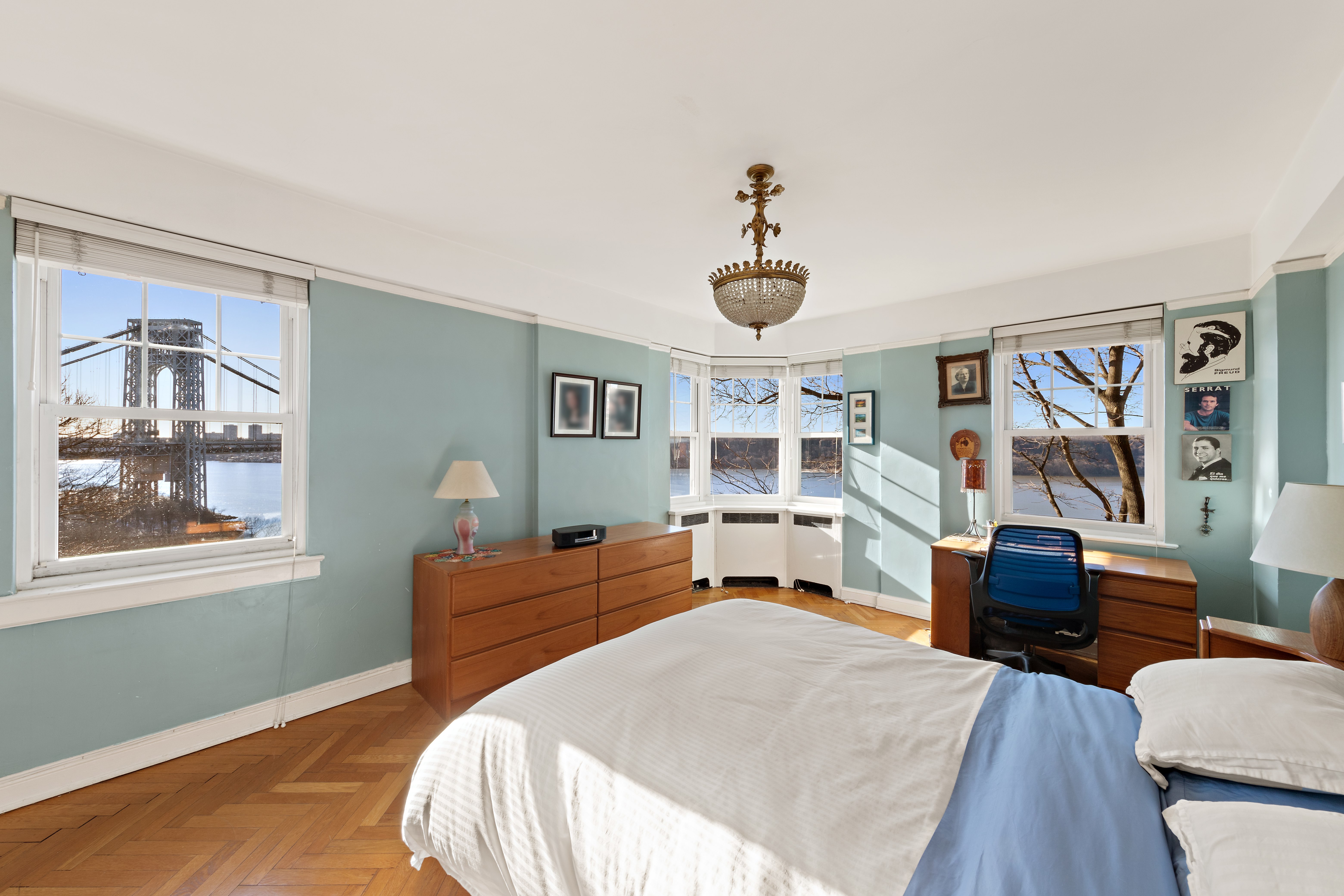 160 Cabrini Boulevard, Unit 19 Manhattan, NY 10033 - Photo 8 of 27 a bedroom with furniture and a window