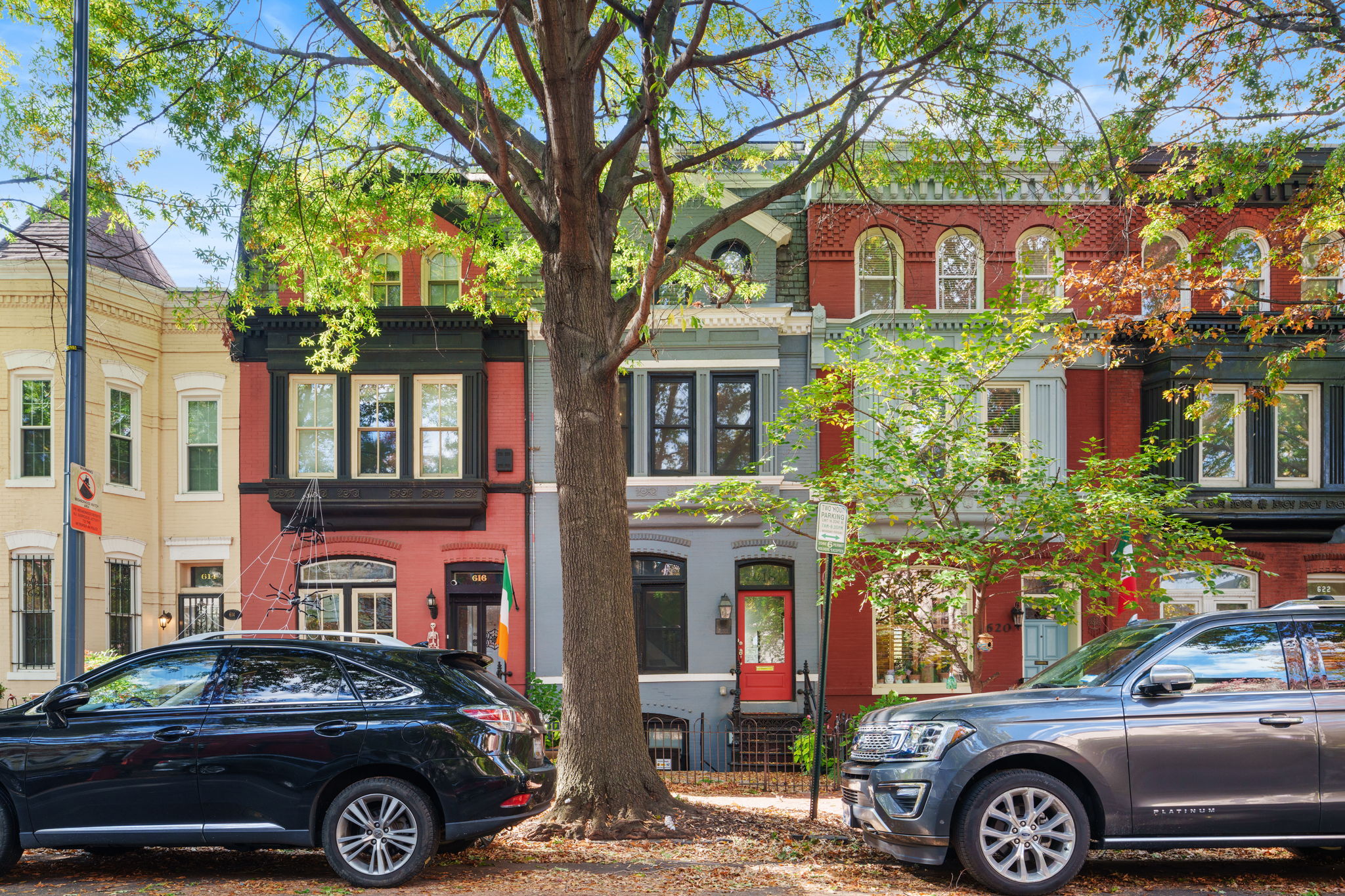 a front view of a house with parking space