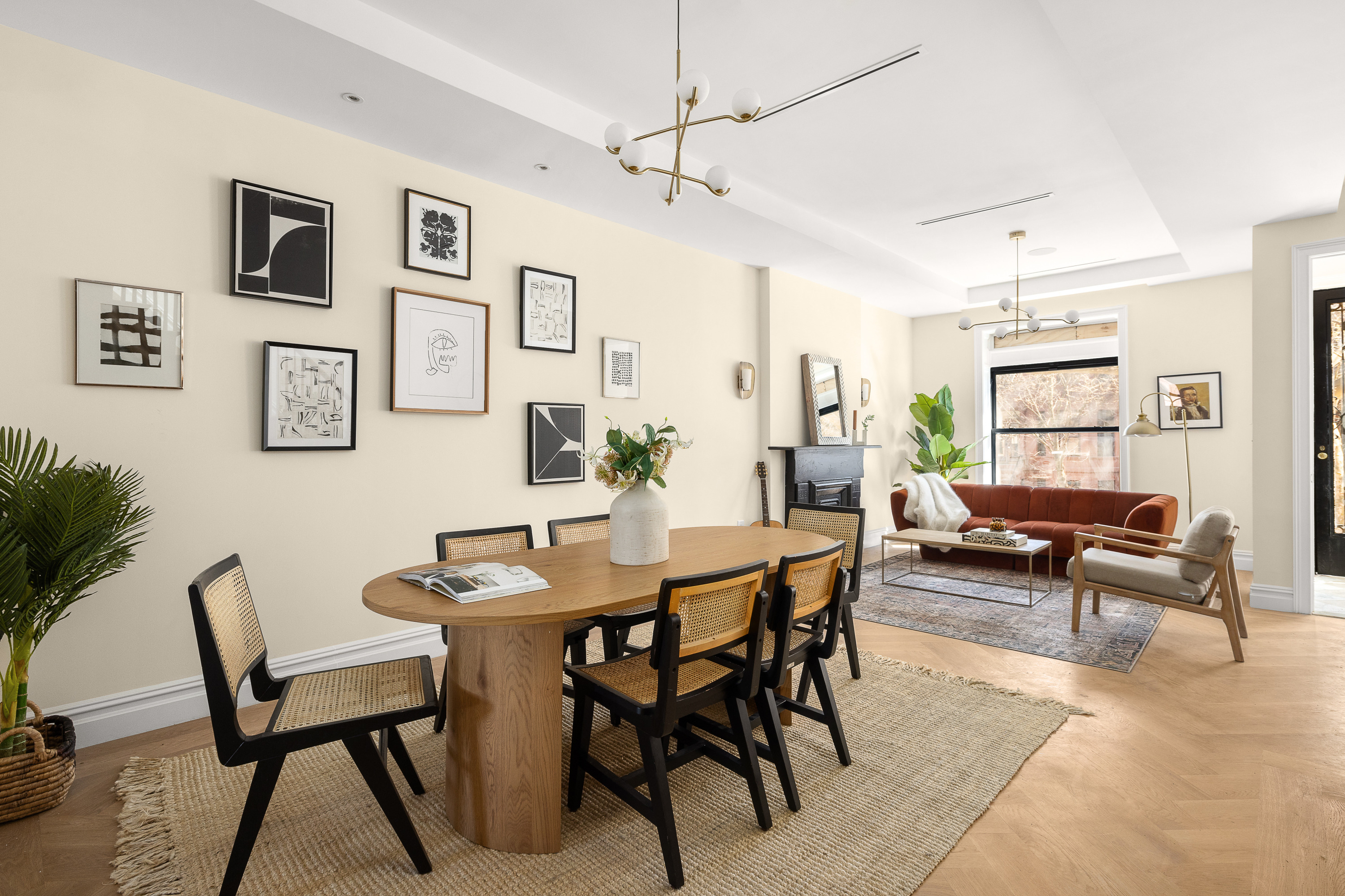 809 Lincoln Place Brooklyn, NY 11216 - Photo 3 of 20 a view of a livingroom and a dining room with furniture window and wooden floor