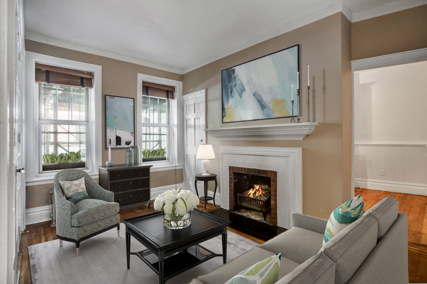 344 West 12th Street, Unit 1A Manhattan, NY 10014 - Photo 2 of 17 a living room with furniture and a fireplace