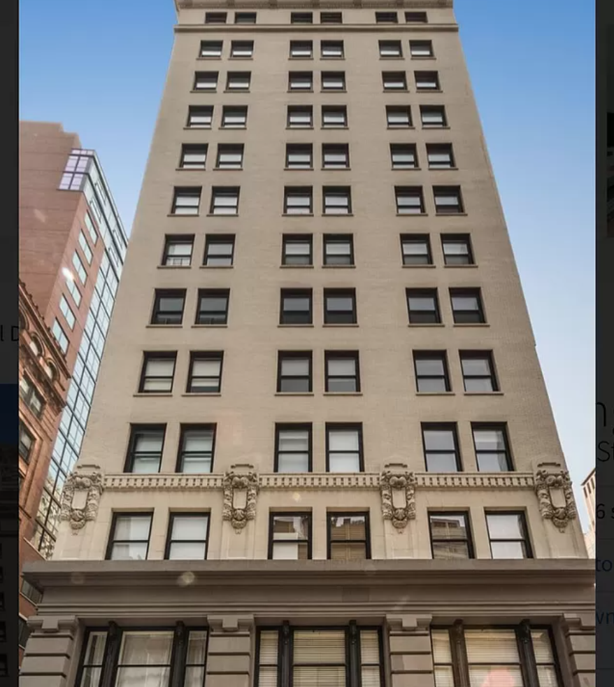 71 Nassau Street, Unit 12C Manhattan, NY 10038 - Photo 16 of 18 front view of a large building