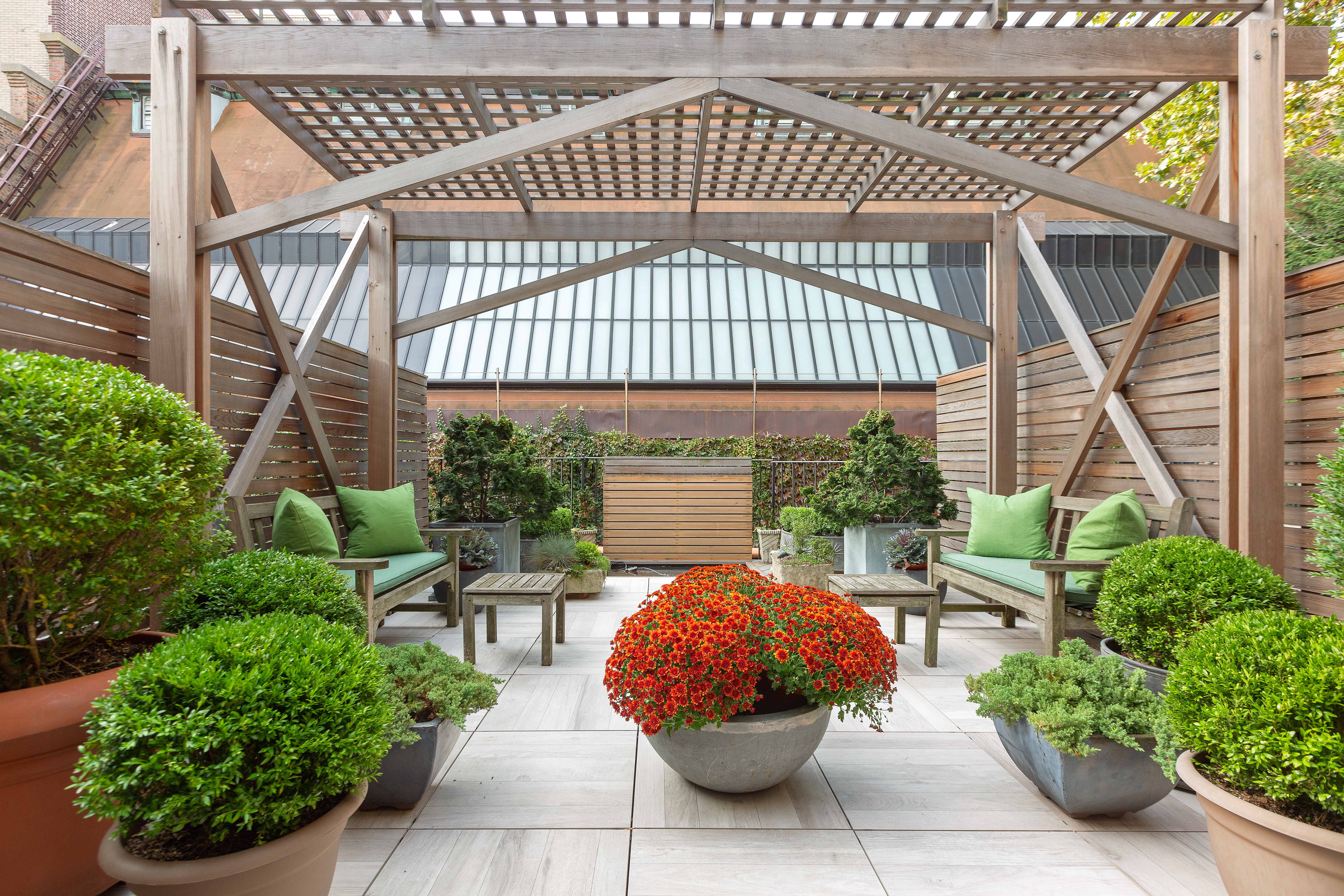 26 Pierrepont Street, Unit 2 Brooklyn, NY 11201 - Photo 6 of 21 a view of a patio with table and chairs potted plants