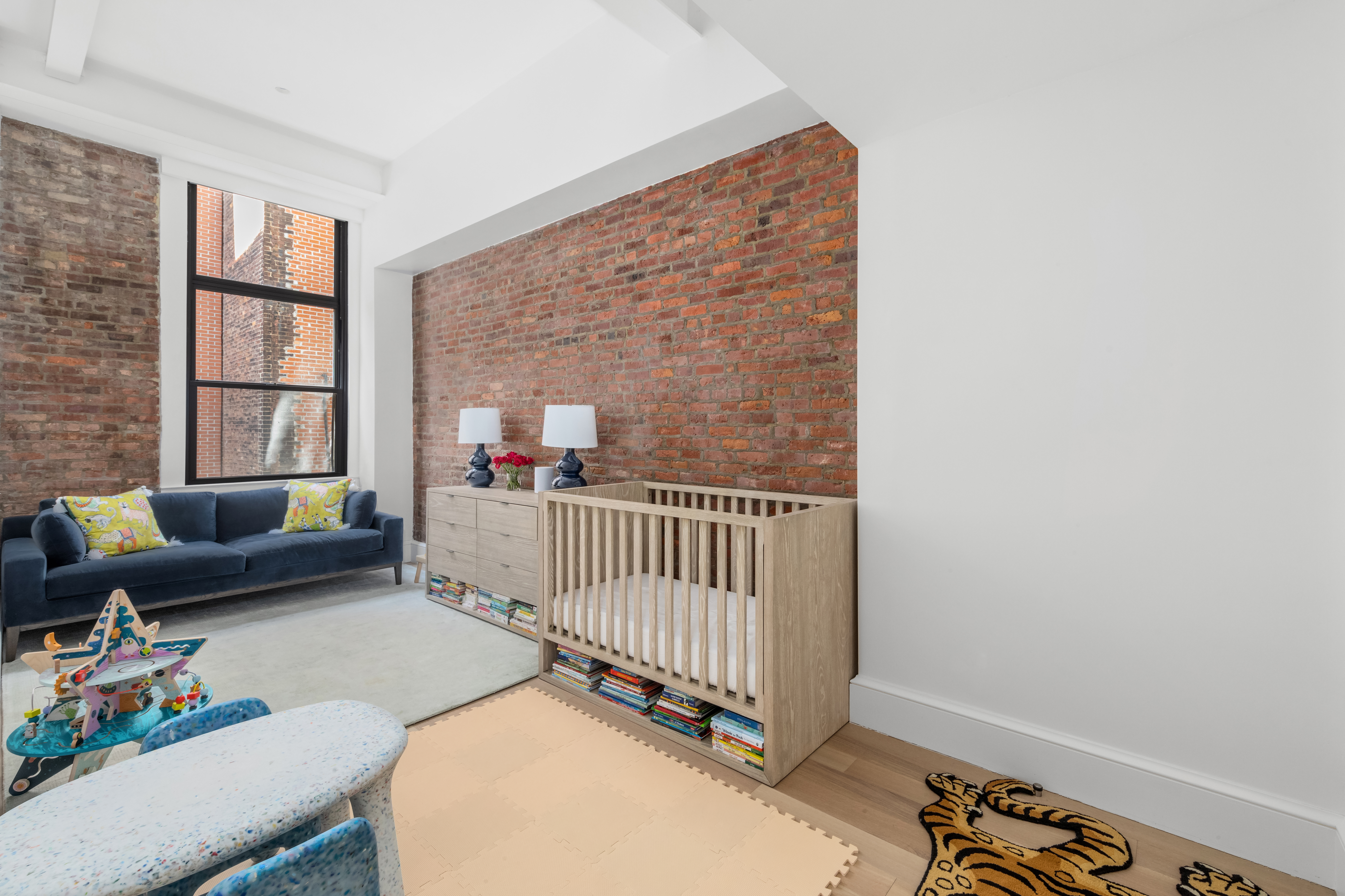 51 Warren Street, Unit 3W Manhattan, NY 10007 - Photo 11 of 13 a bedroom with furniture and a window