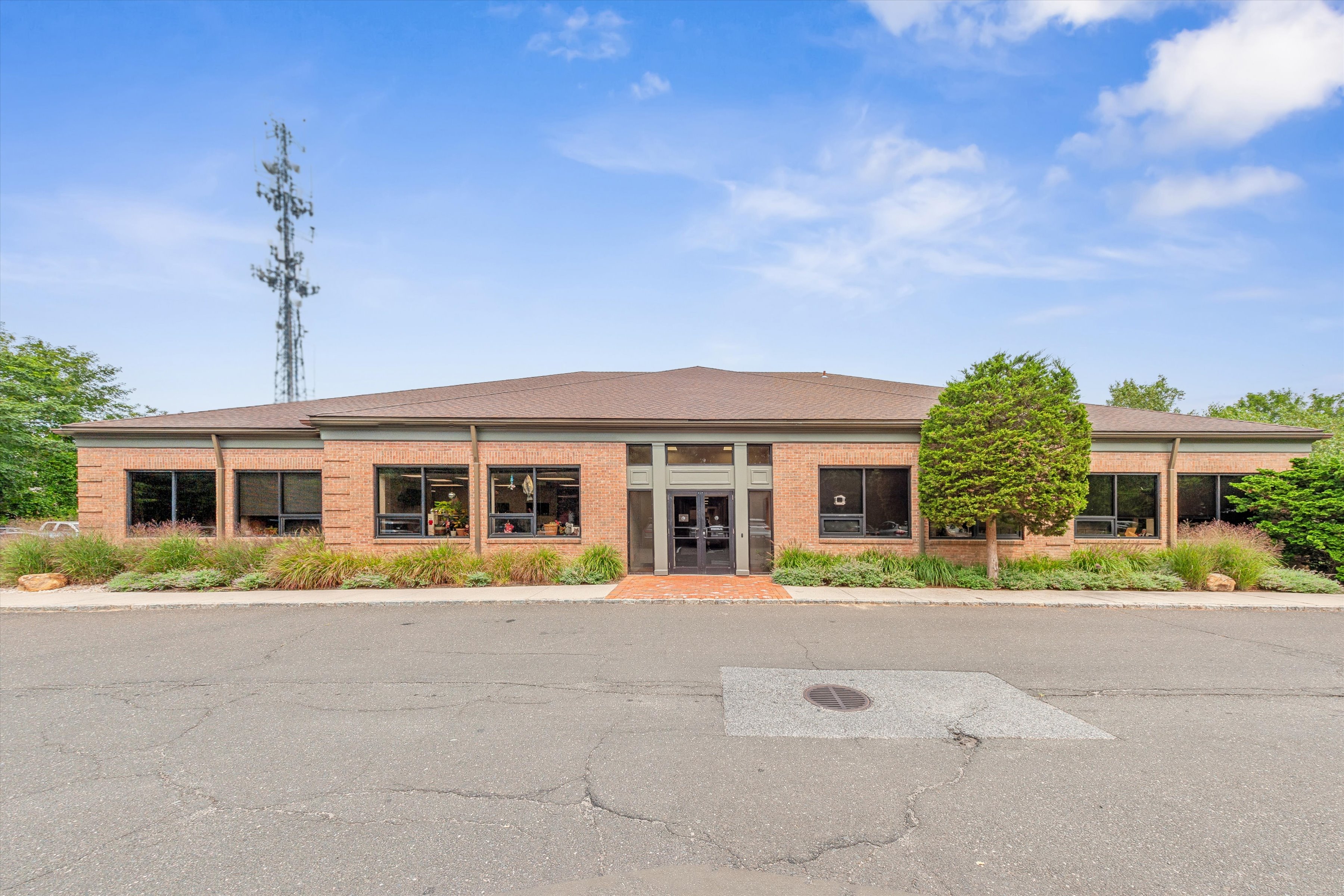 300 Pantigo Road East Hampton, NY 11937 - Photo 3 of 18 a front view of house with a garden