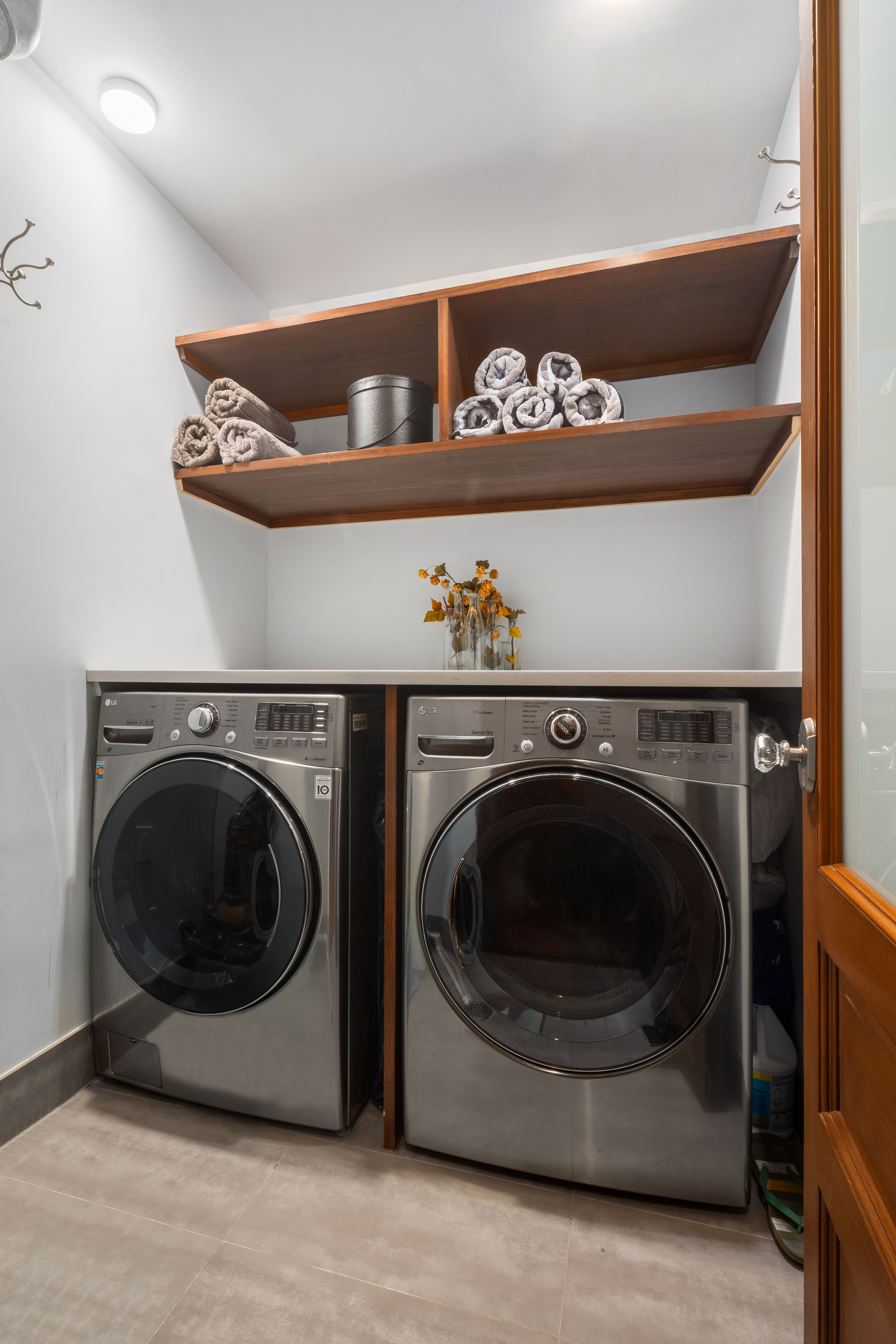 145 West 126th Street, Unit 1 Manhattan, NY 10027 - Photo 14 of 19 a utility room with dryer and washer