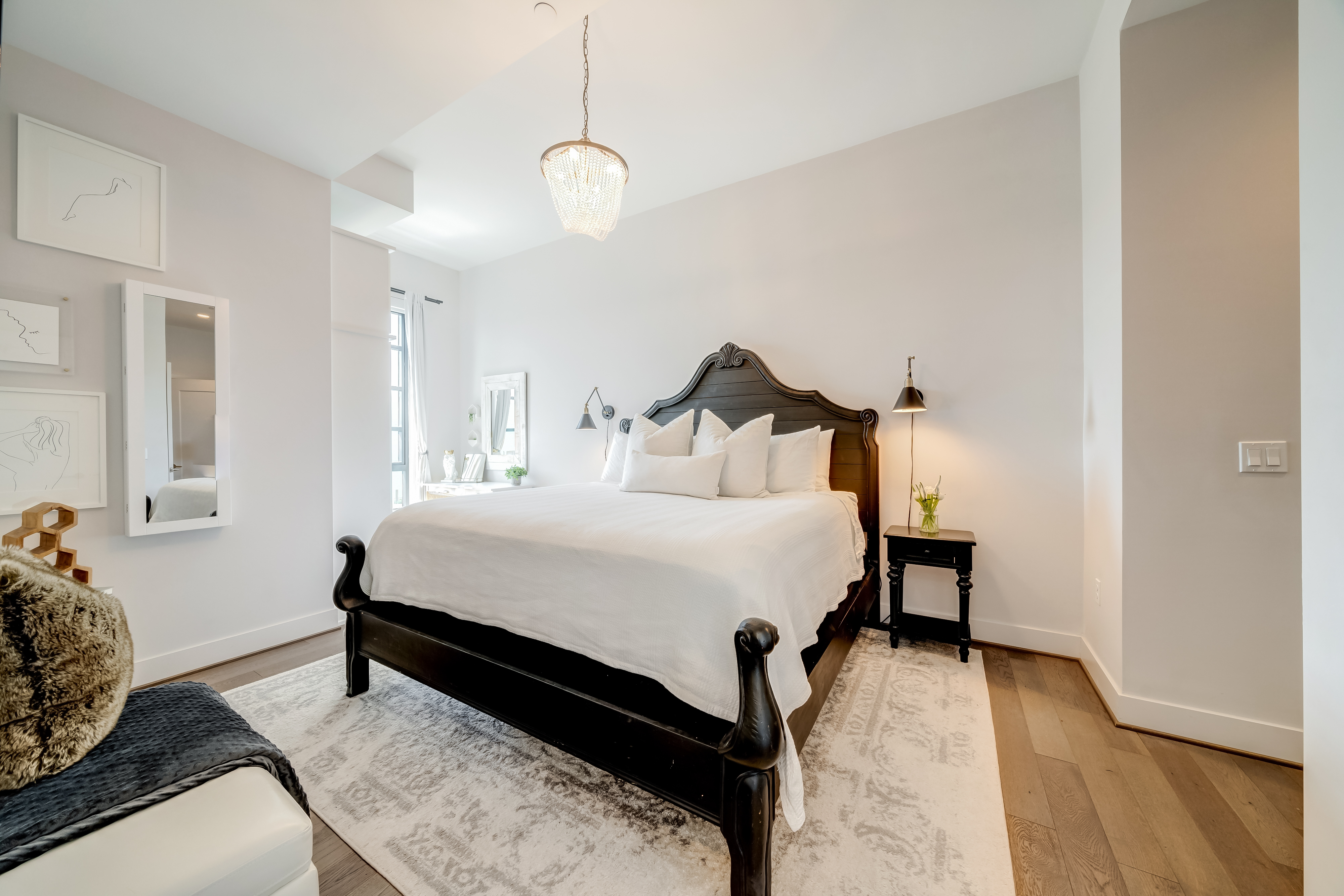 45 Sutton Square Southwest, Unit PH10 Washington, DC 20024 - Photo 21 of 44 a bedroom with a bed and wooden floor