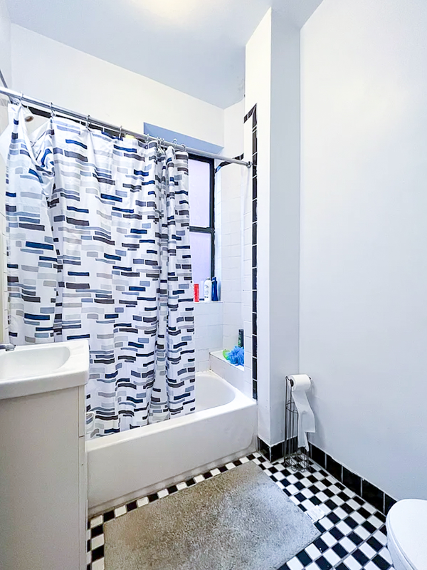 55 East 2nd Street, Unit 7 Manhattan, NY 10003 - Photo 10 of 18 a bathroom with a bathtub and shower