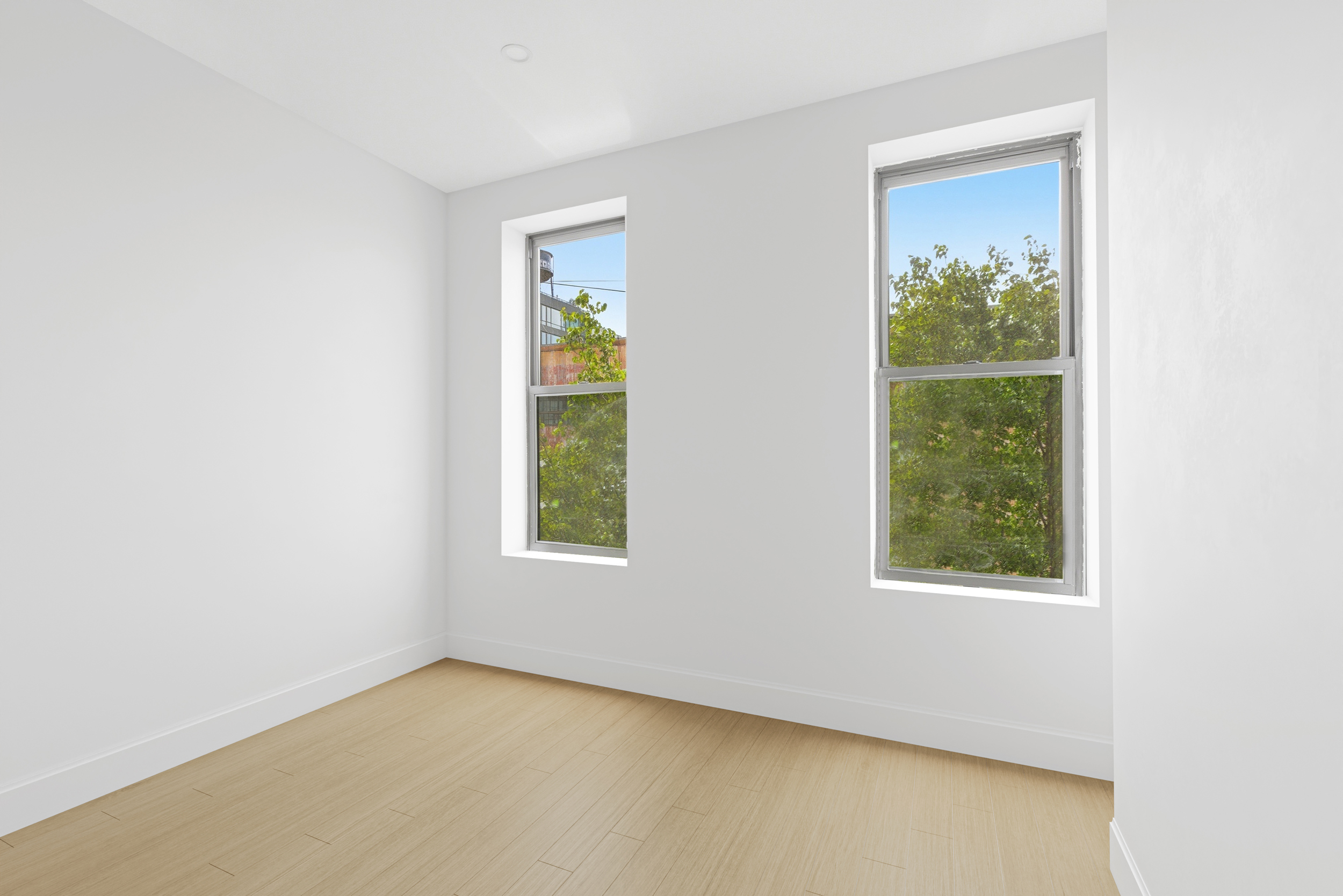 29 Greenpoint Avenue Brooklyn, NY 11222 - Photo 11 of 18 an empty room with a window