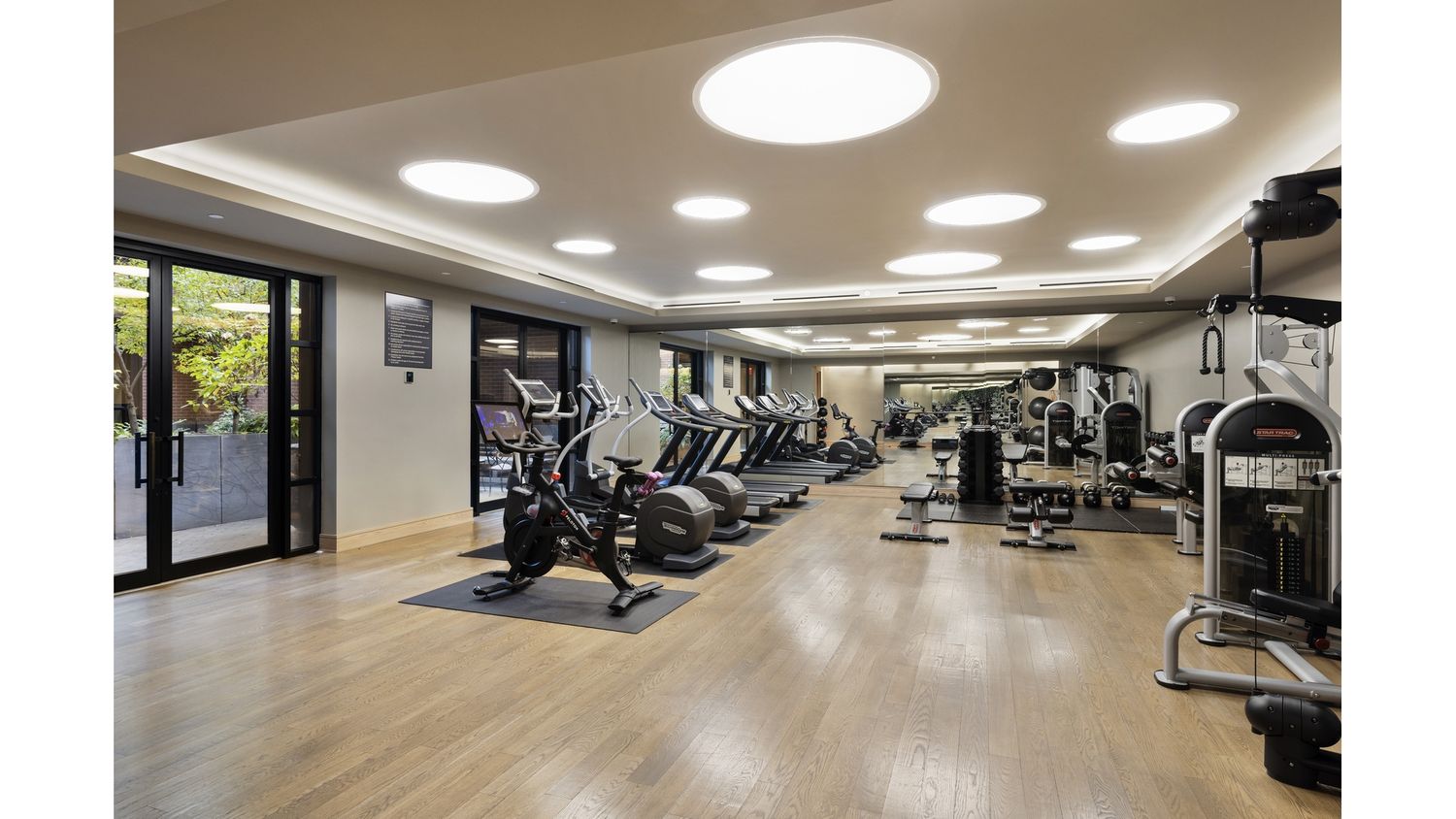 261 West 25th Street, Unit 4A Manhattan, NY 10001 - Photo 13 of 16 a view of a room with gym equipment