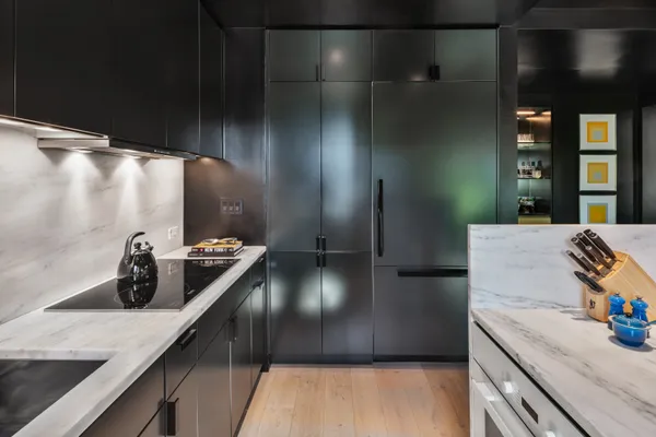 a kitchen with a sink and stove