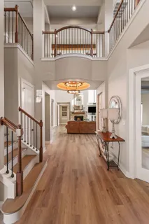 a kitchen with stainless steel appliances granite countertop a stove and a refrigerator