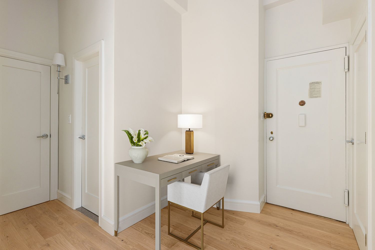 11 Riverside Drive, Unit 17E Manhattan, NY 10023 - Photo 8 of 16 a view of a workspace with furniture and wooden floor